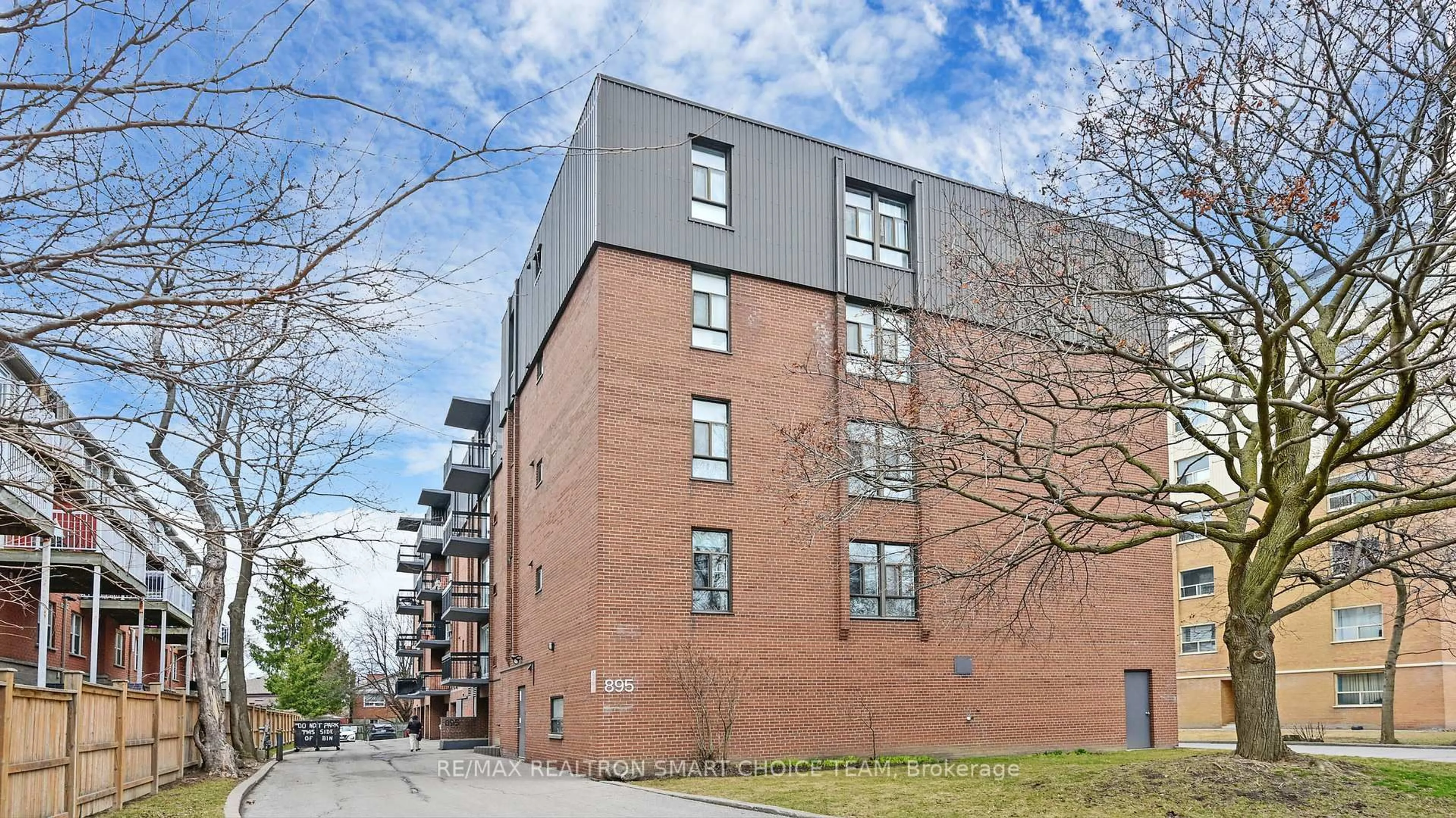 Home with brick exterior material, building for 895 Kennedy Rd #505, Toronto Ontario M1K 2E9