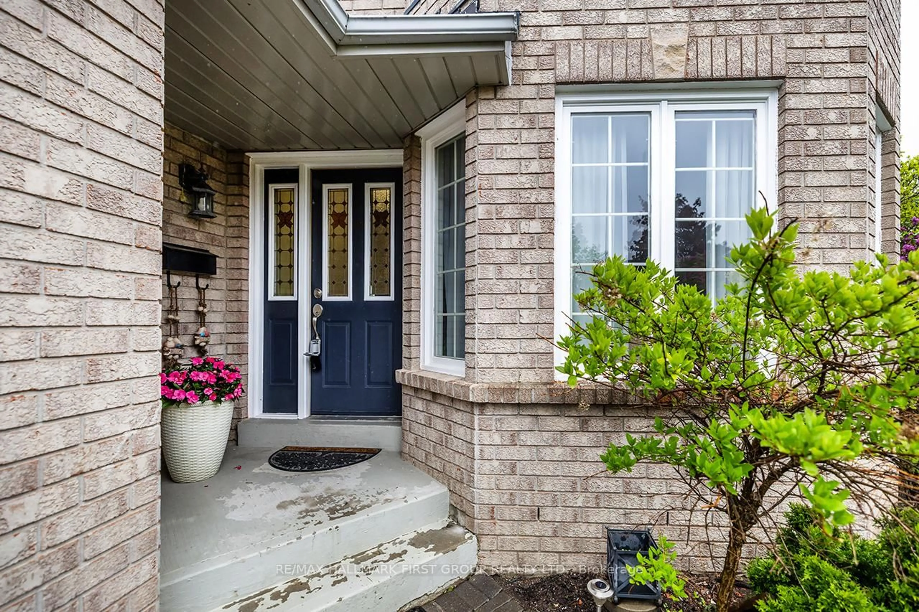 Home with brick exterior material, street for 1 Watersdown Cres, Whitby Ontario L1R 1Z1
