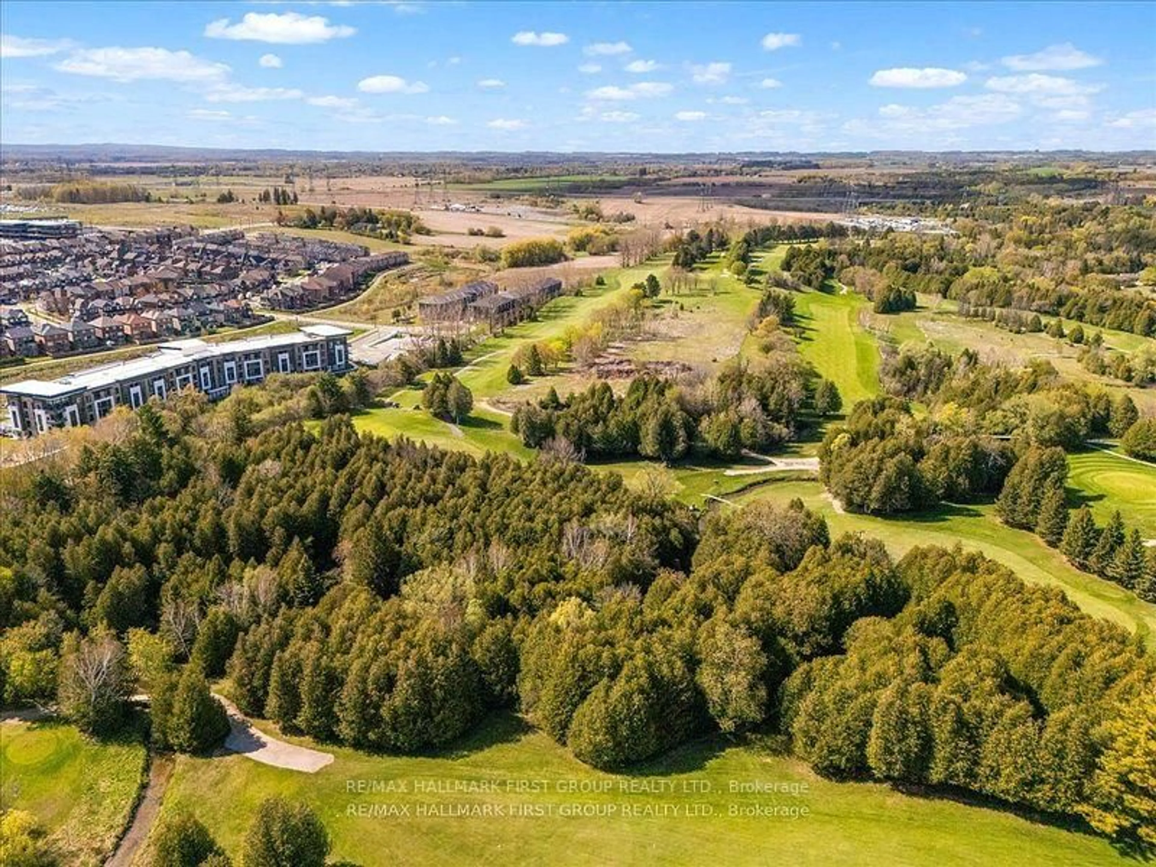 A pic from outside/outdoor area/front of a property/back of a property/a pic from drone, forest/trees view for 385 Arctic Red Dr #409, Oshawa Ontario L1L 0W9