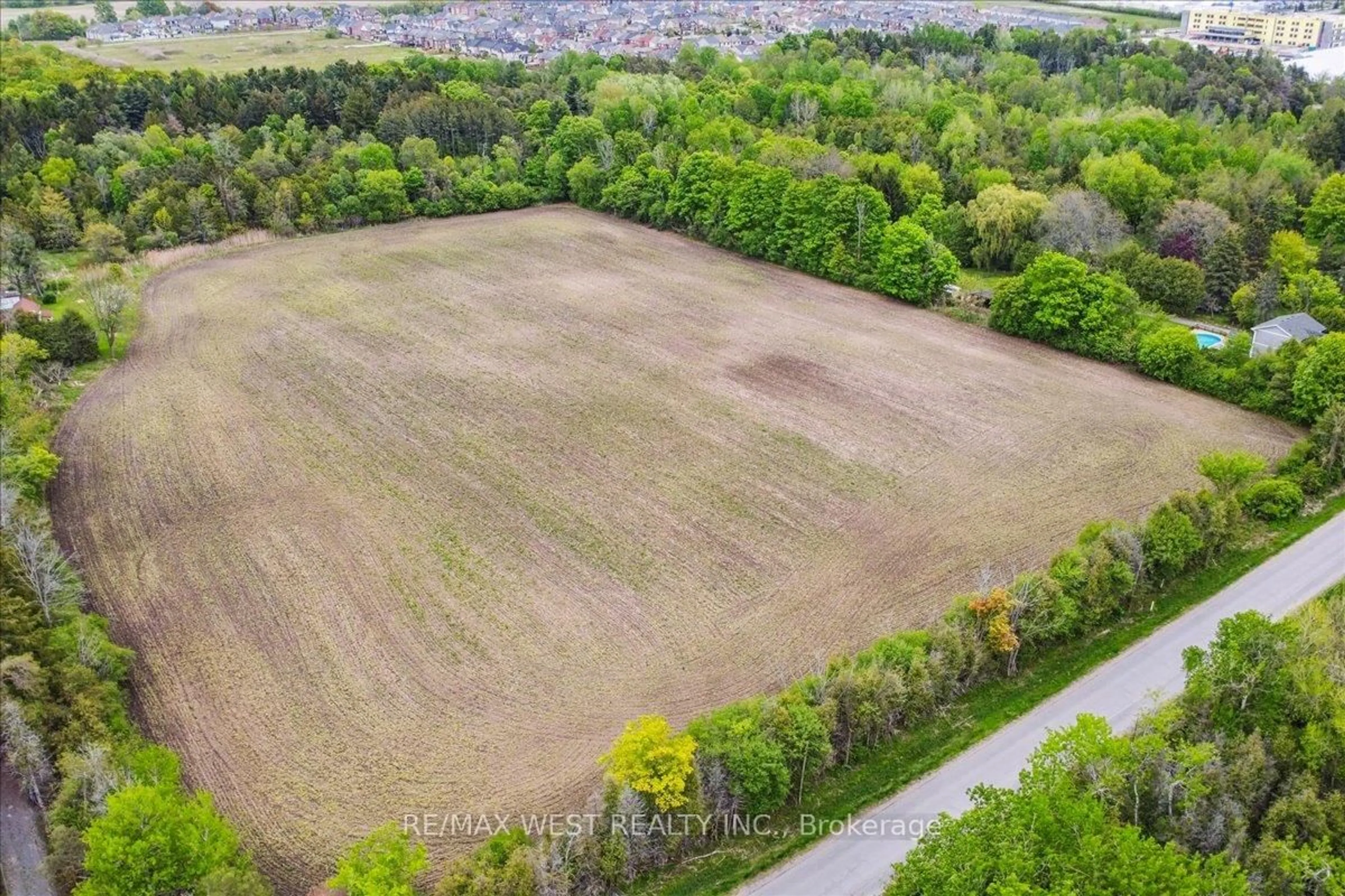 A pic from outside/outdoor area/front of a property/back of a property/a pic from drone, forest/trees view for 2495 Maple Grove Rd, Clarington Ontario L1C 6N1