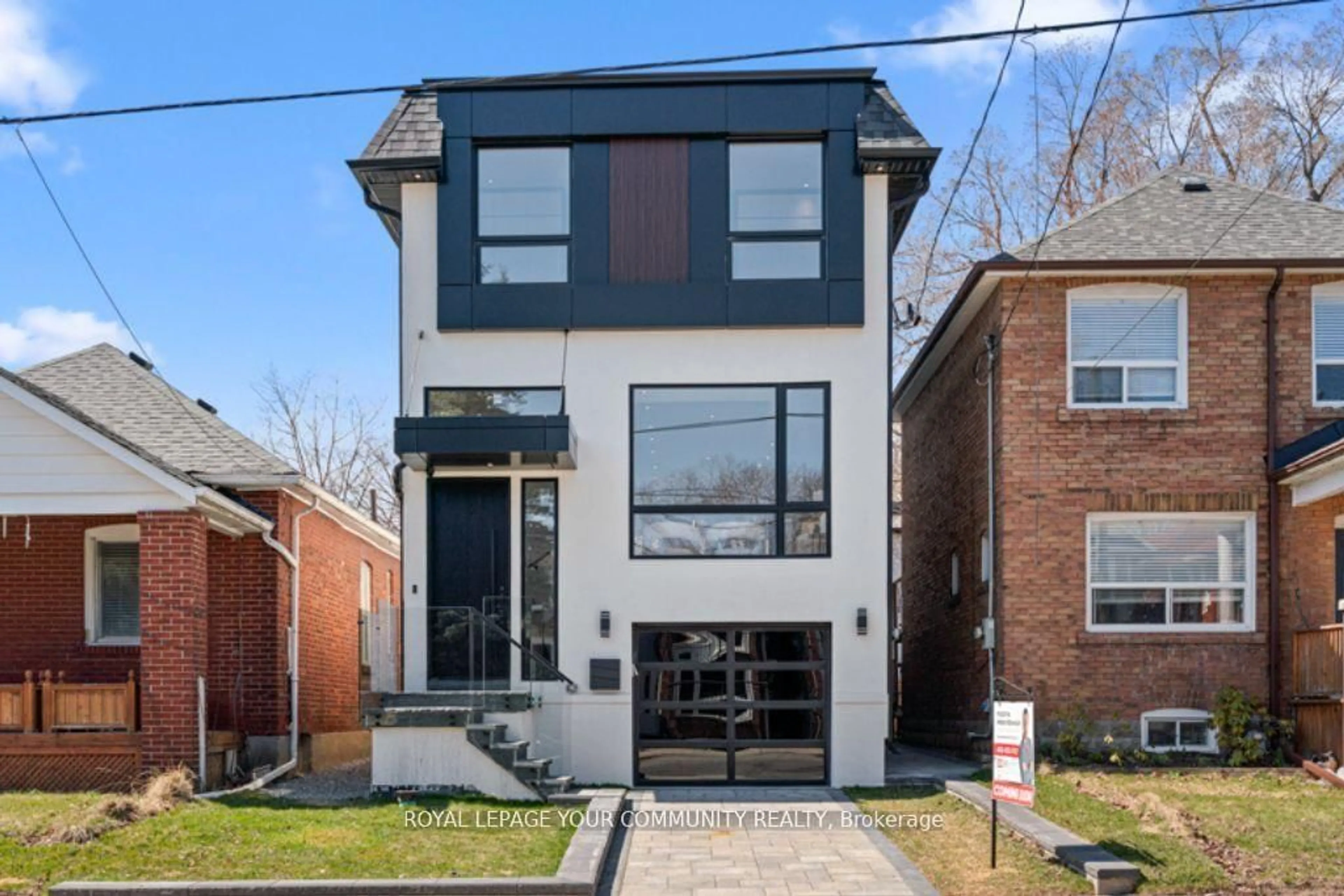 Home with brick exterior material, street for 266 Westlake Ave, Toronto Ontario M4C 4T6