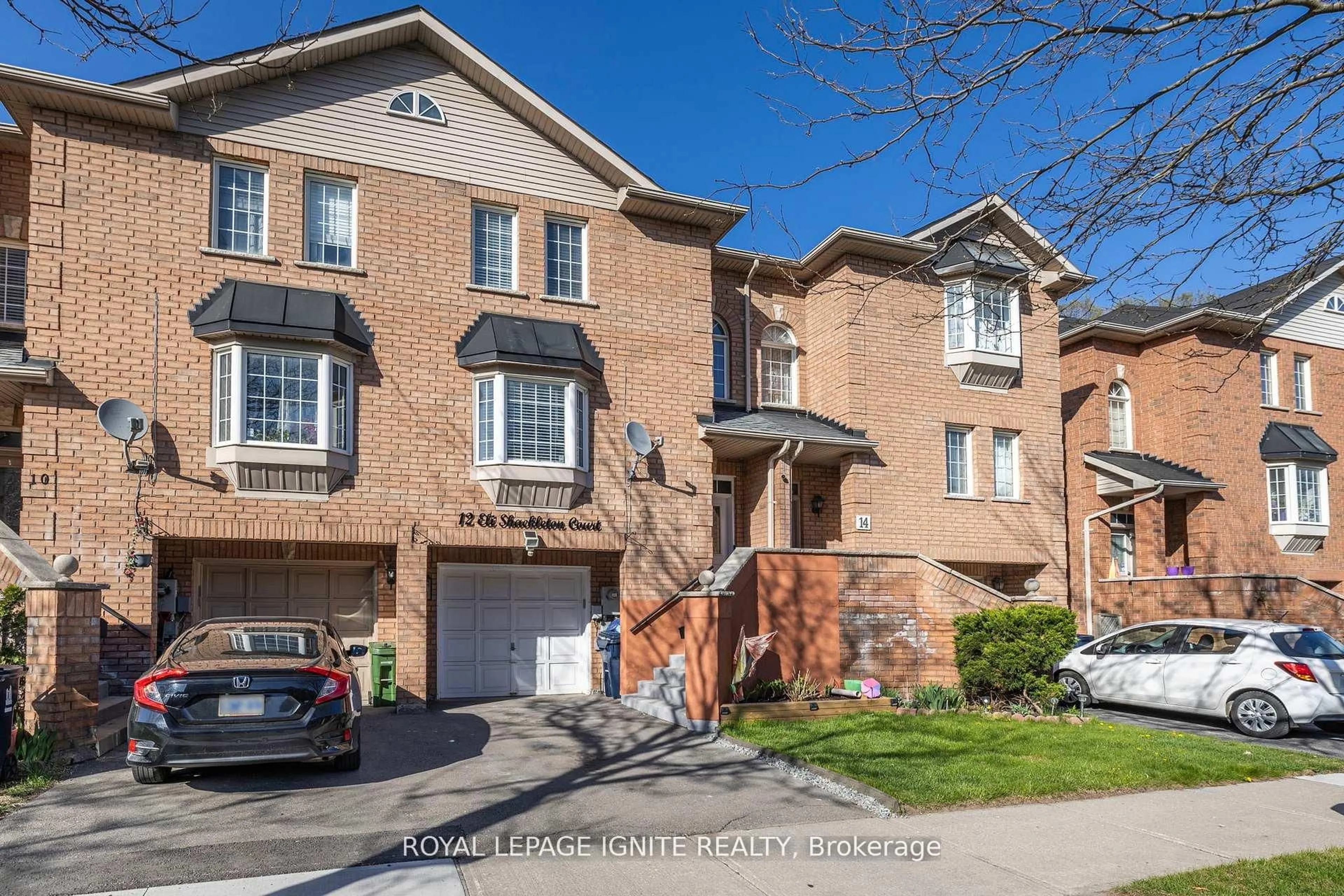 Home with brick exterior material, street for 12 Eli Shackleton Crt, Toronto Ontario M1E 5K3