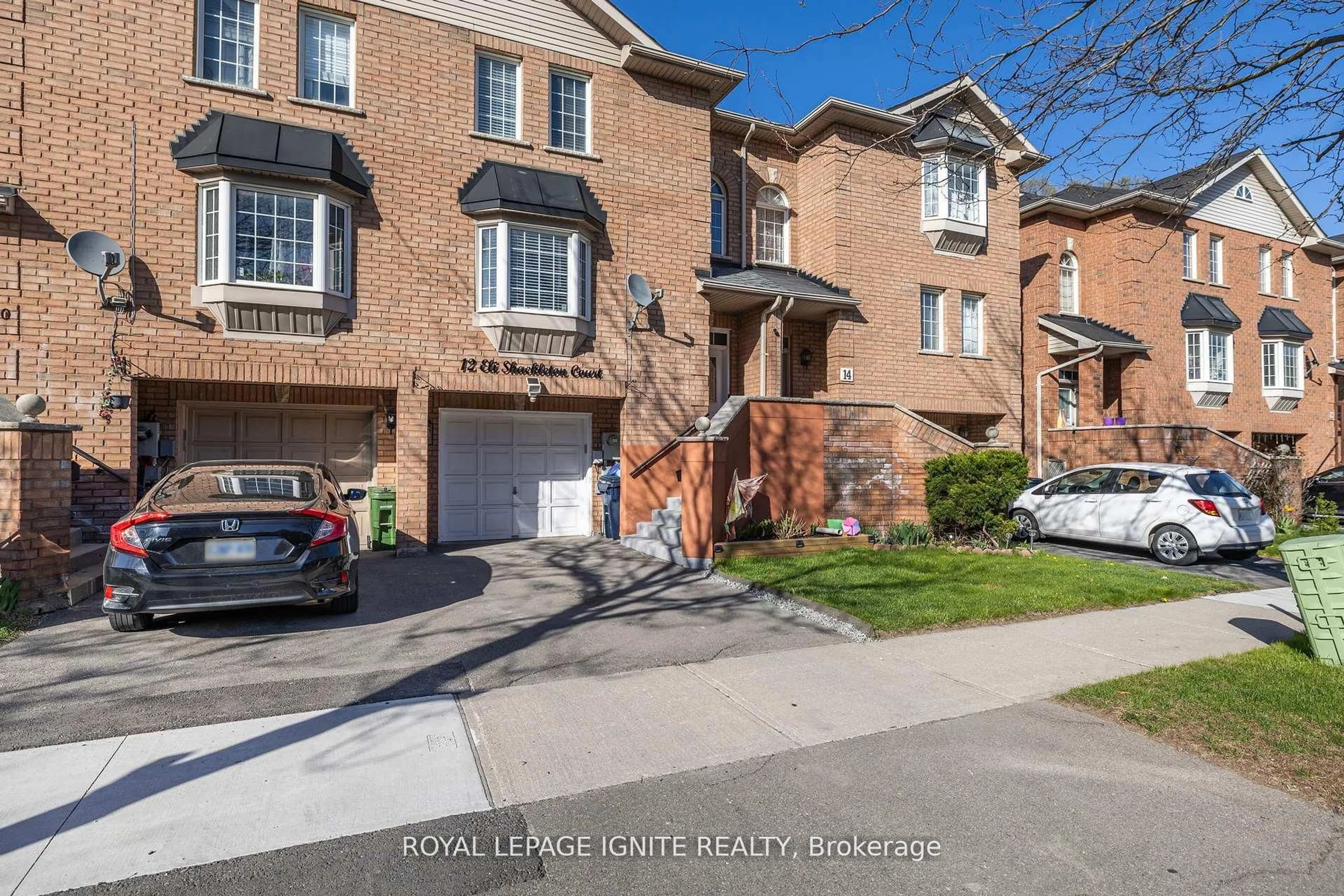 Home with brick exterior material, street for 12 Eli Shackleton Crt, Toronto Ontario M1E 5K3