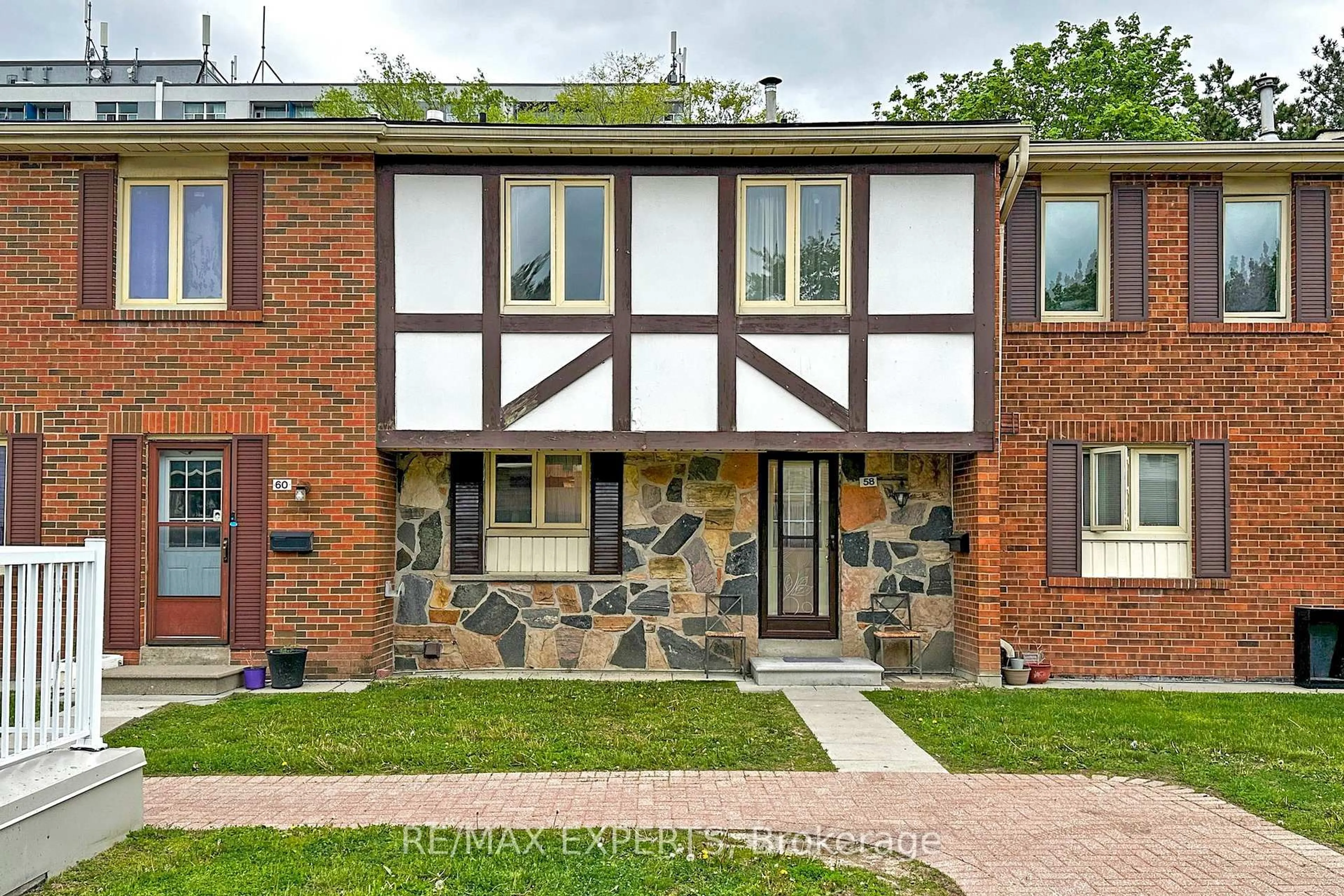Home with brick exterior material, street for 270 Timberbank Blvd #58, Toronto Ontario M1W 2M1