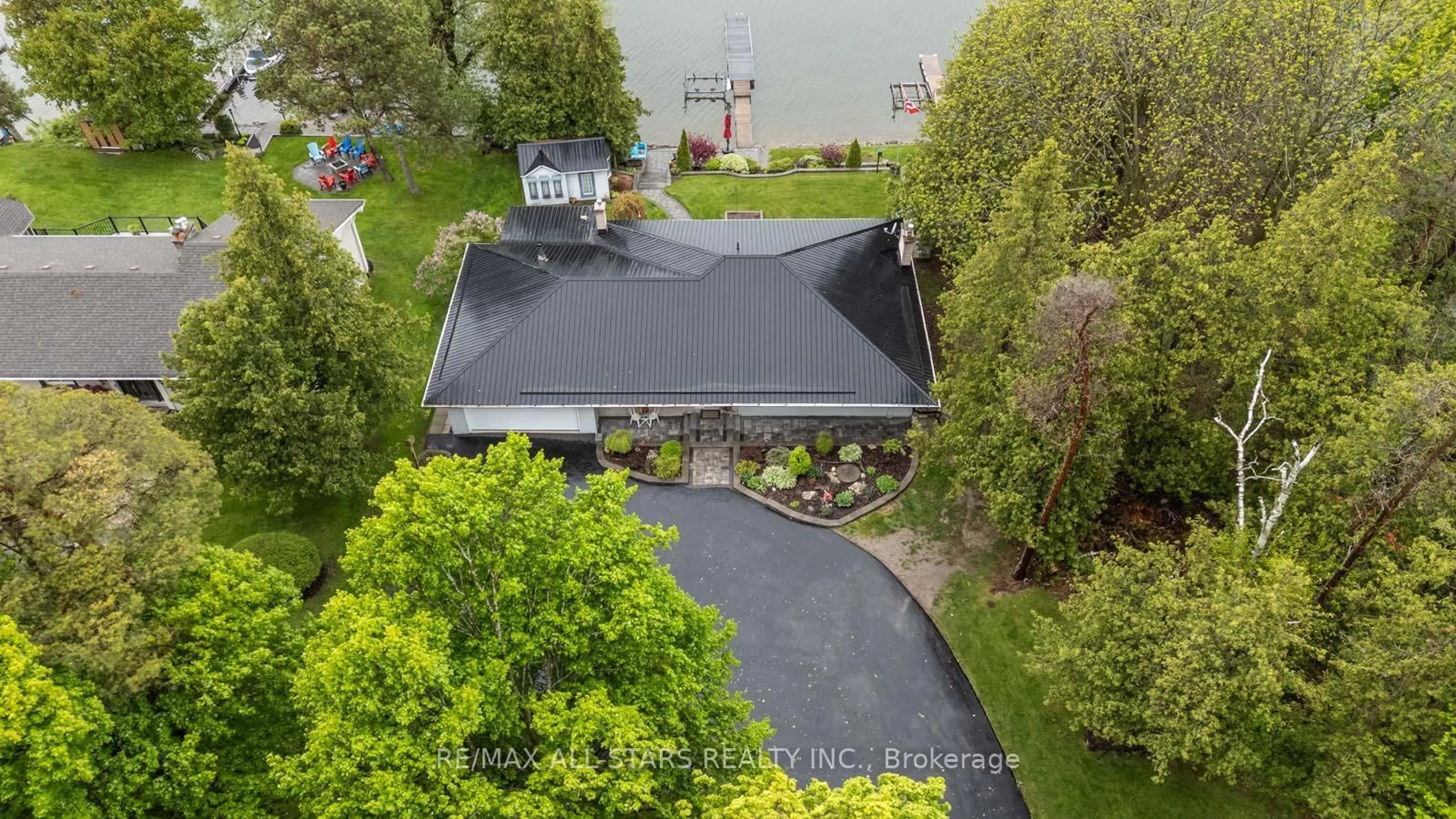 A pic from outside/outdoor area/front of a property/back of a property/a pic from drone, water/lake/river/ocean view for 231 Stephenson Point Rd, Scugog Ontario L9L 1B4
