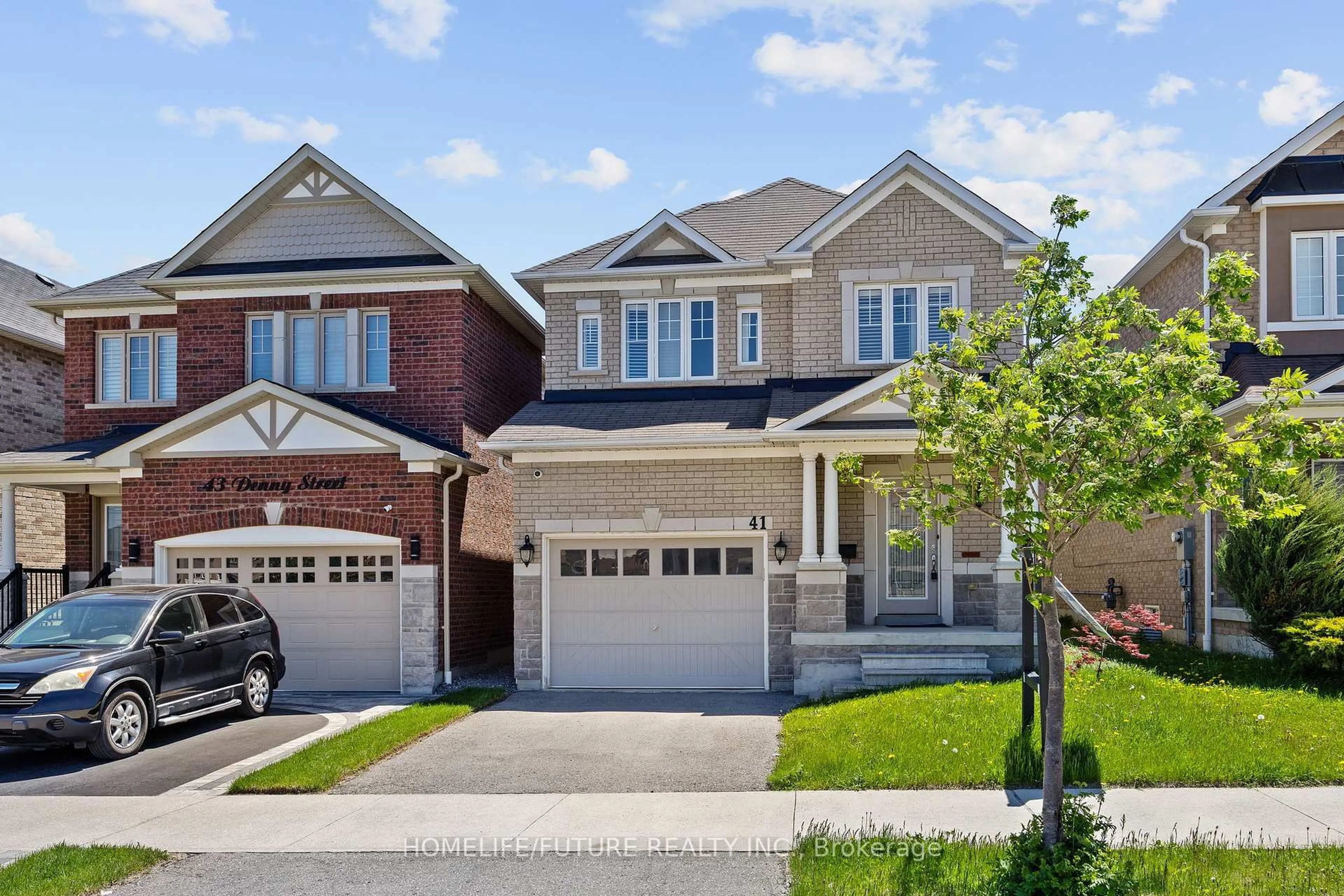 Home with brick exterior material, street for 41 Denny St, Ajax Ontario L1Z 0S3