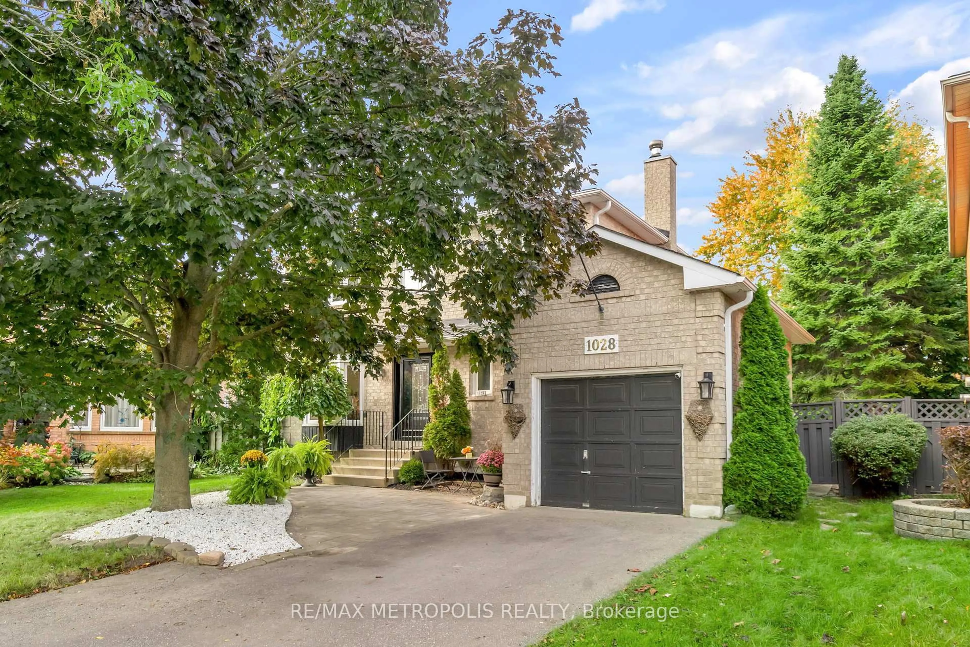 Home with brick exterior material, street for 1028 Moorelands Cres, Pickering Ontario L1W 3K4