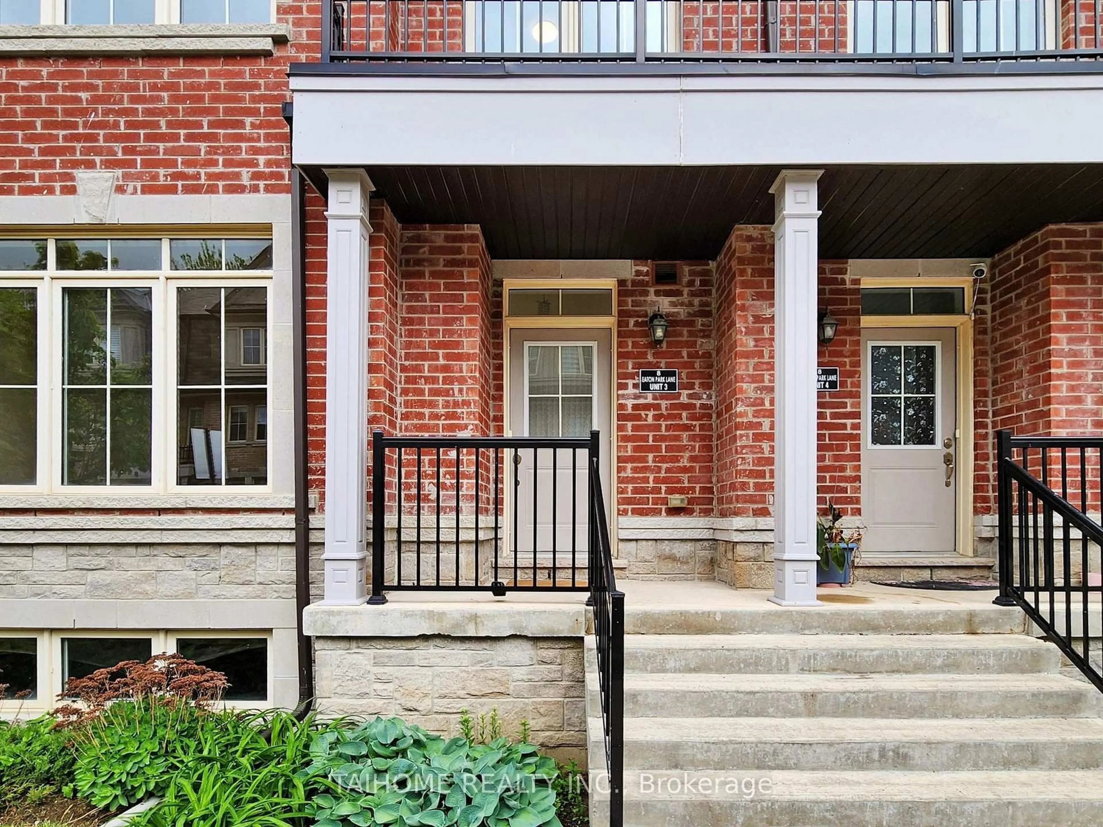 Home with brick exterior material, street for 8 Eaton Park Lane #3, Toronto Ontario M1W 0A5