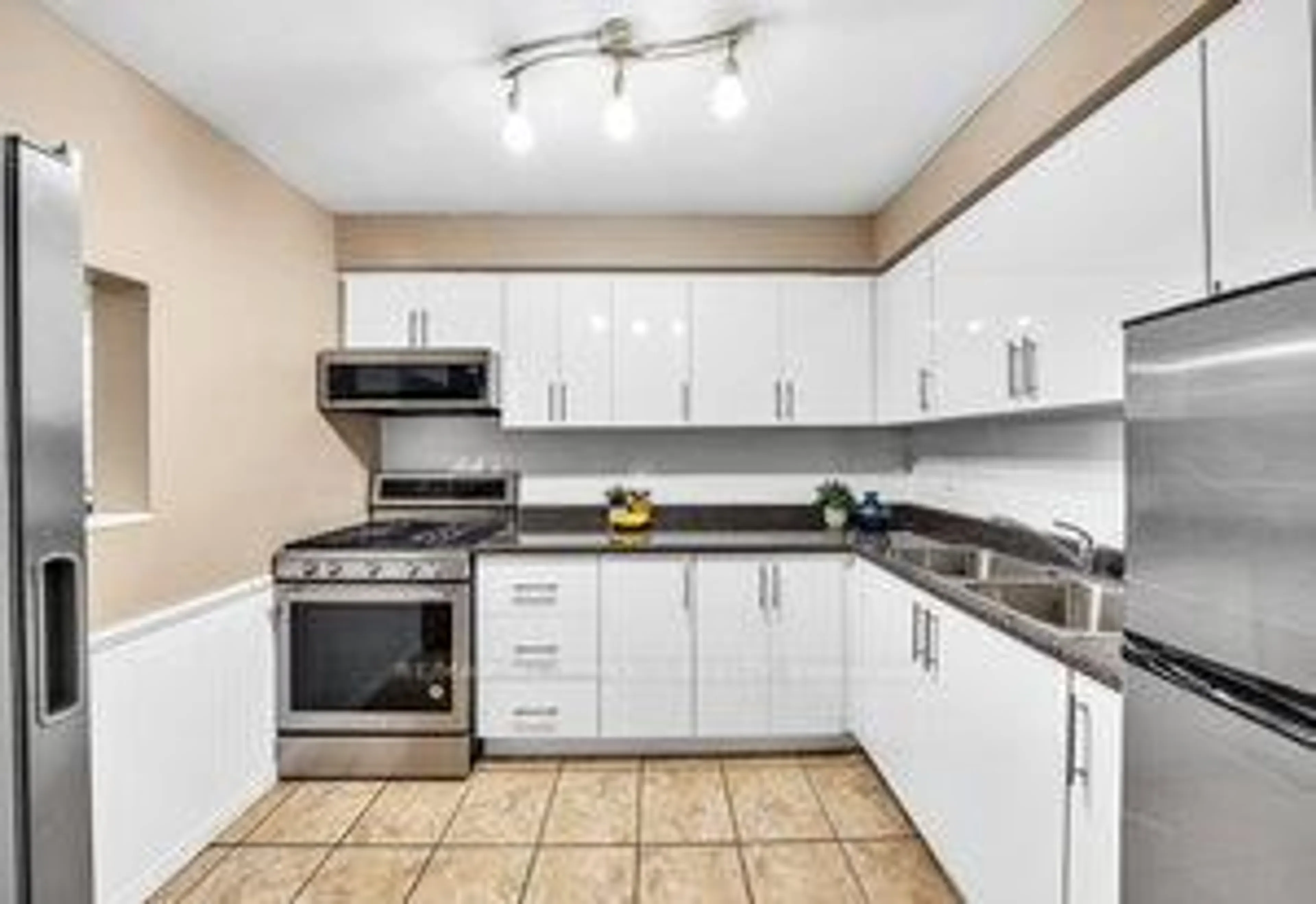 Standard kitchen, ceramic/tile floor for 1980 Rosefield Rd #15, Pickering Ontario L1V 3M4