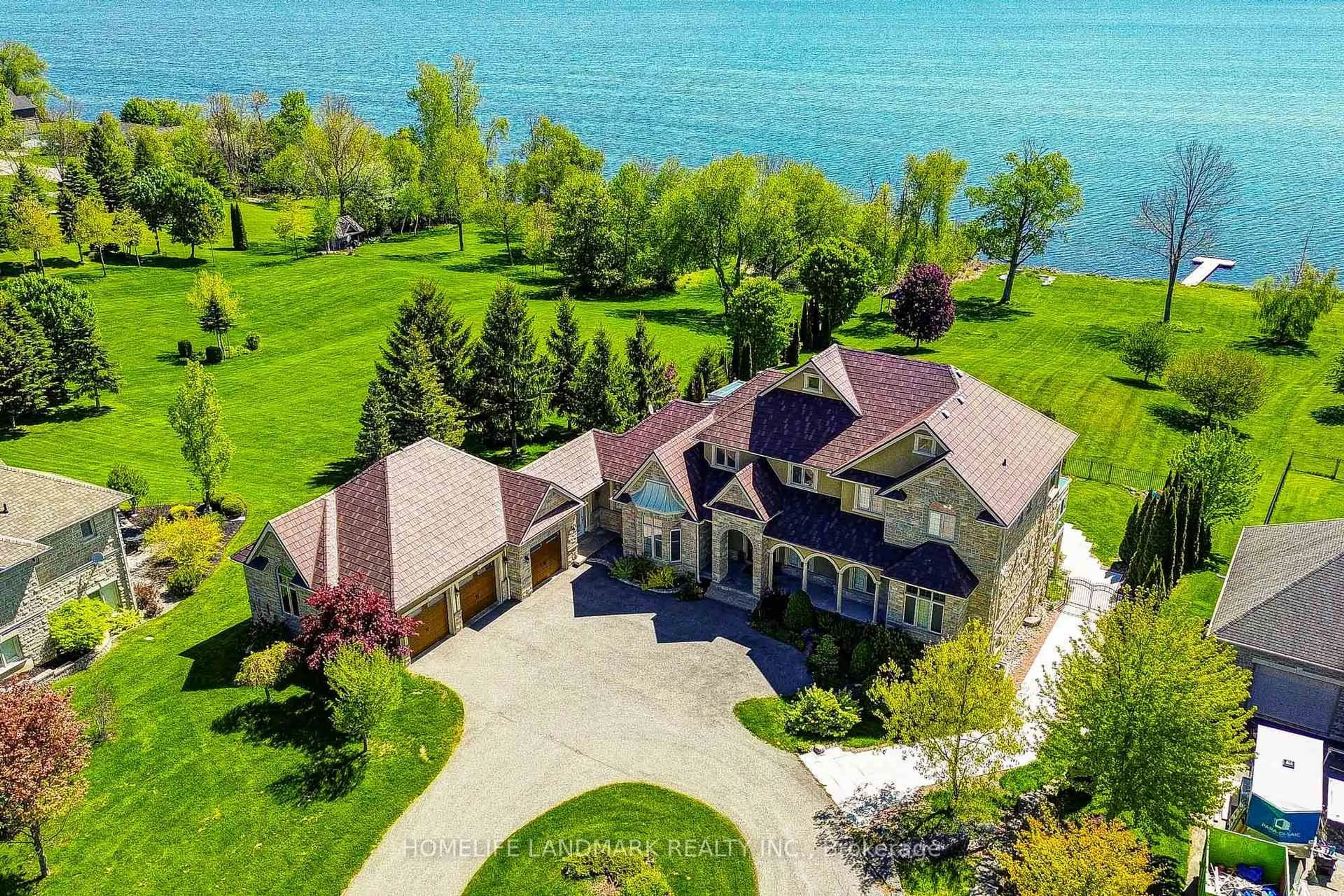 A pic from outside/outdoor area/front of a property/back of a property/a pic from drone, water/lake/river/ocean view for 104 Cawkers Cove Rd, Scugog Ontario L9L 1R6