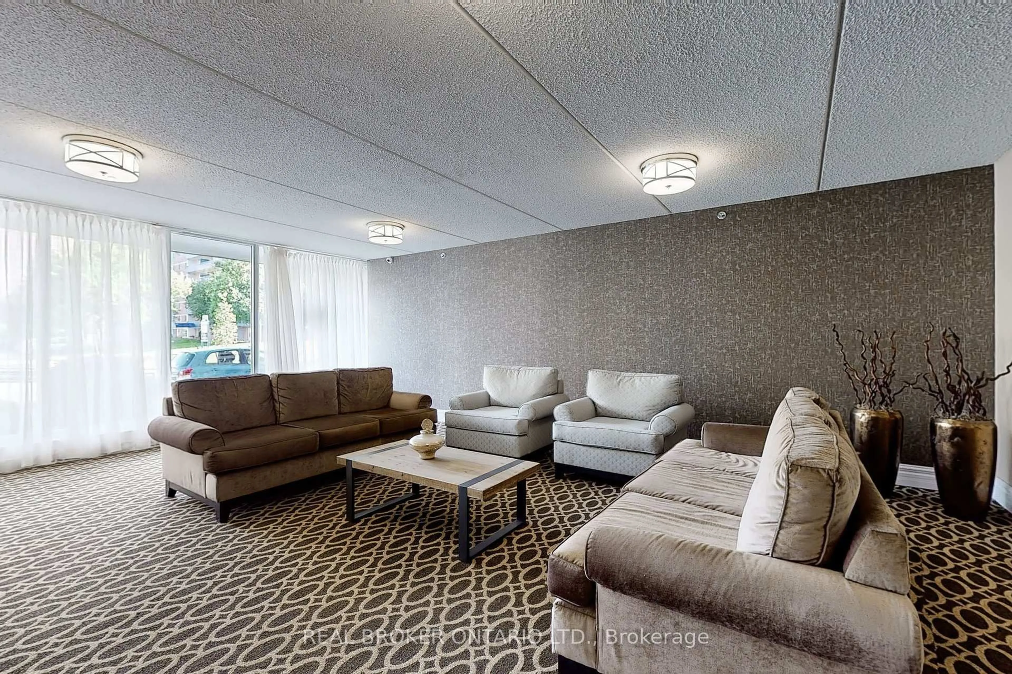 Living room with furniture, carpet floor for 2 GLAMORGAN Ave #1012, Toronto Ontario M1P 2M8