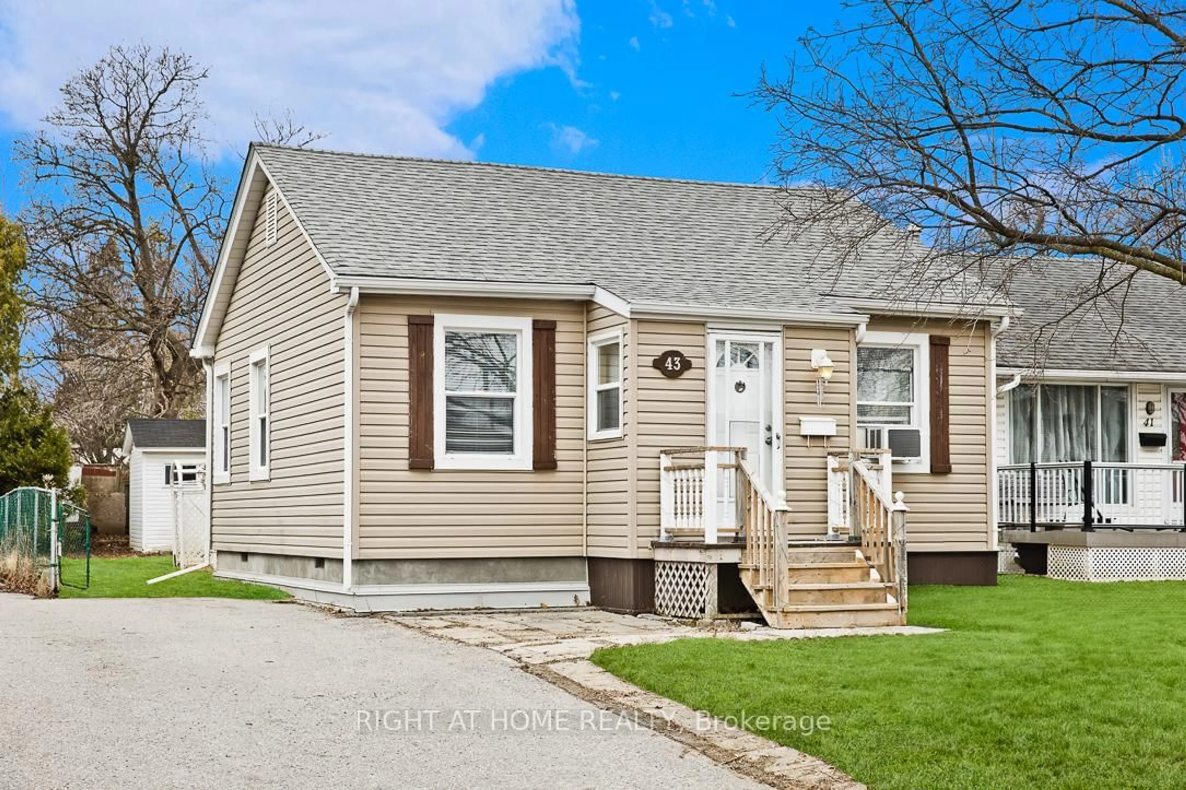 Home with vinyl exterior material, street for 43 Glynn Rd, Ajax Ontario L1S 2C4
