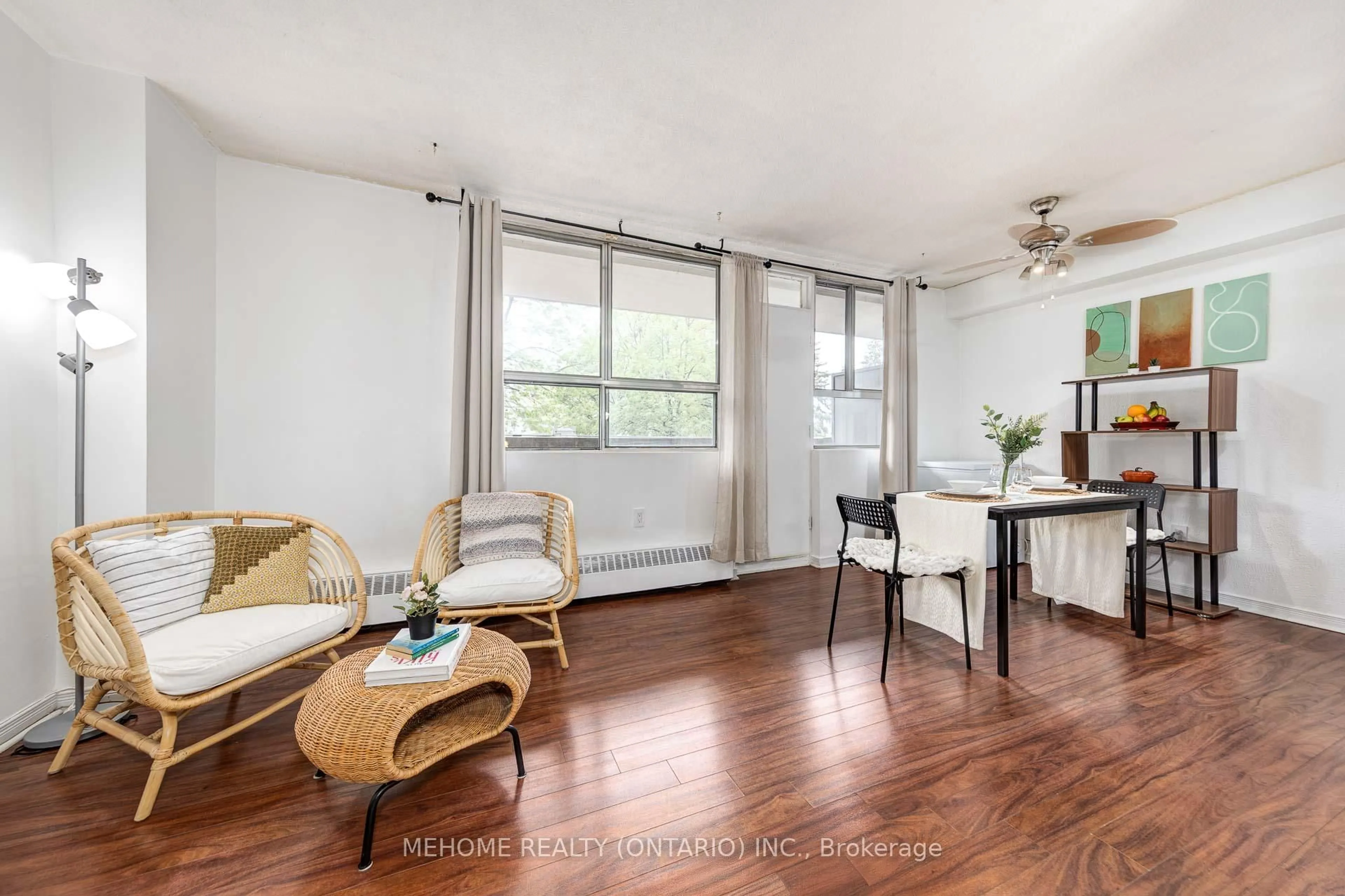 Living room with furniture, wood/laminate floor for 1950 Kennedy Rd #207, Toronto Ontario M1P 4S9