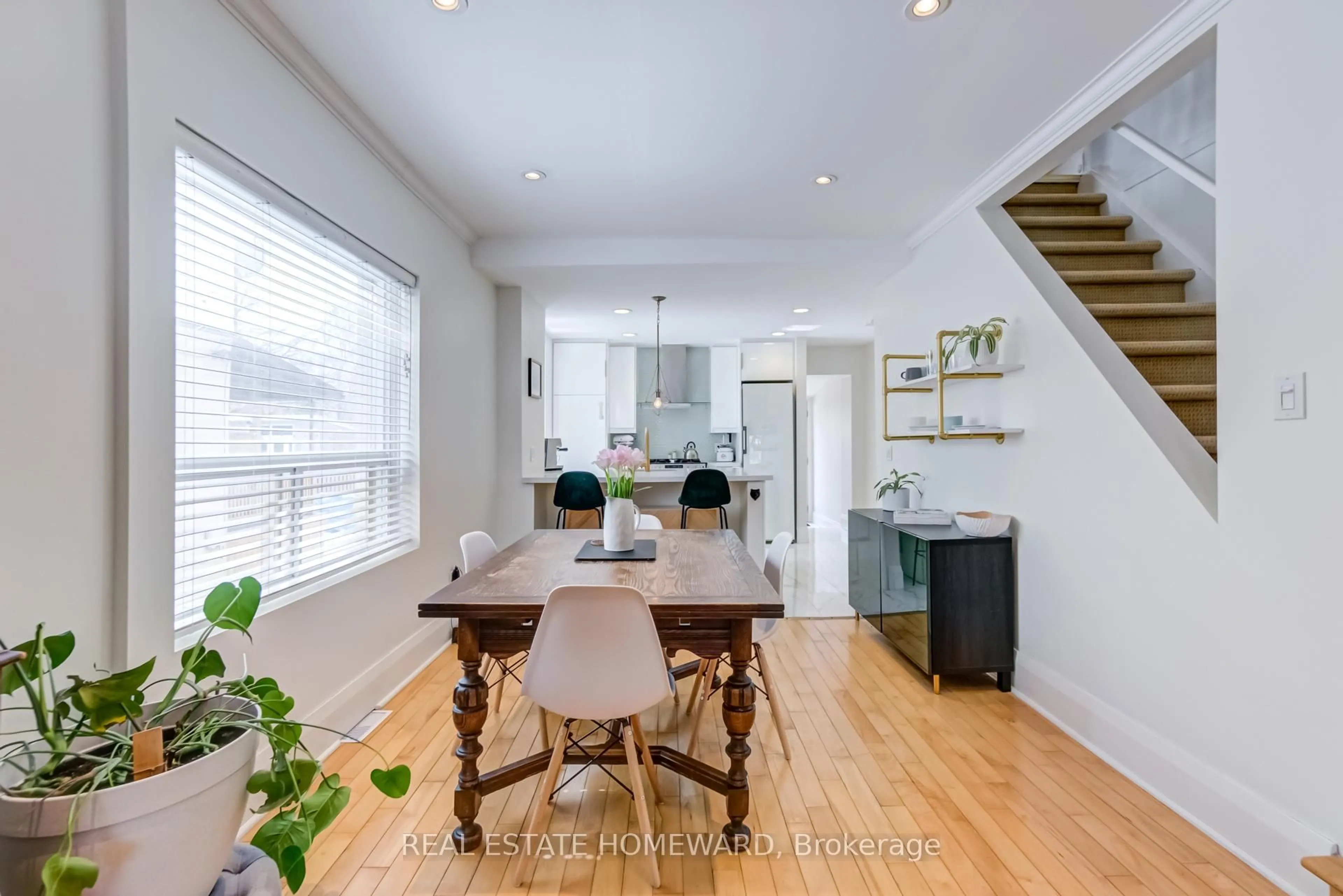 Dining room, wood/laminate floor for 68 Wayland Ave, Toronto Ontario M4E 3C9