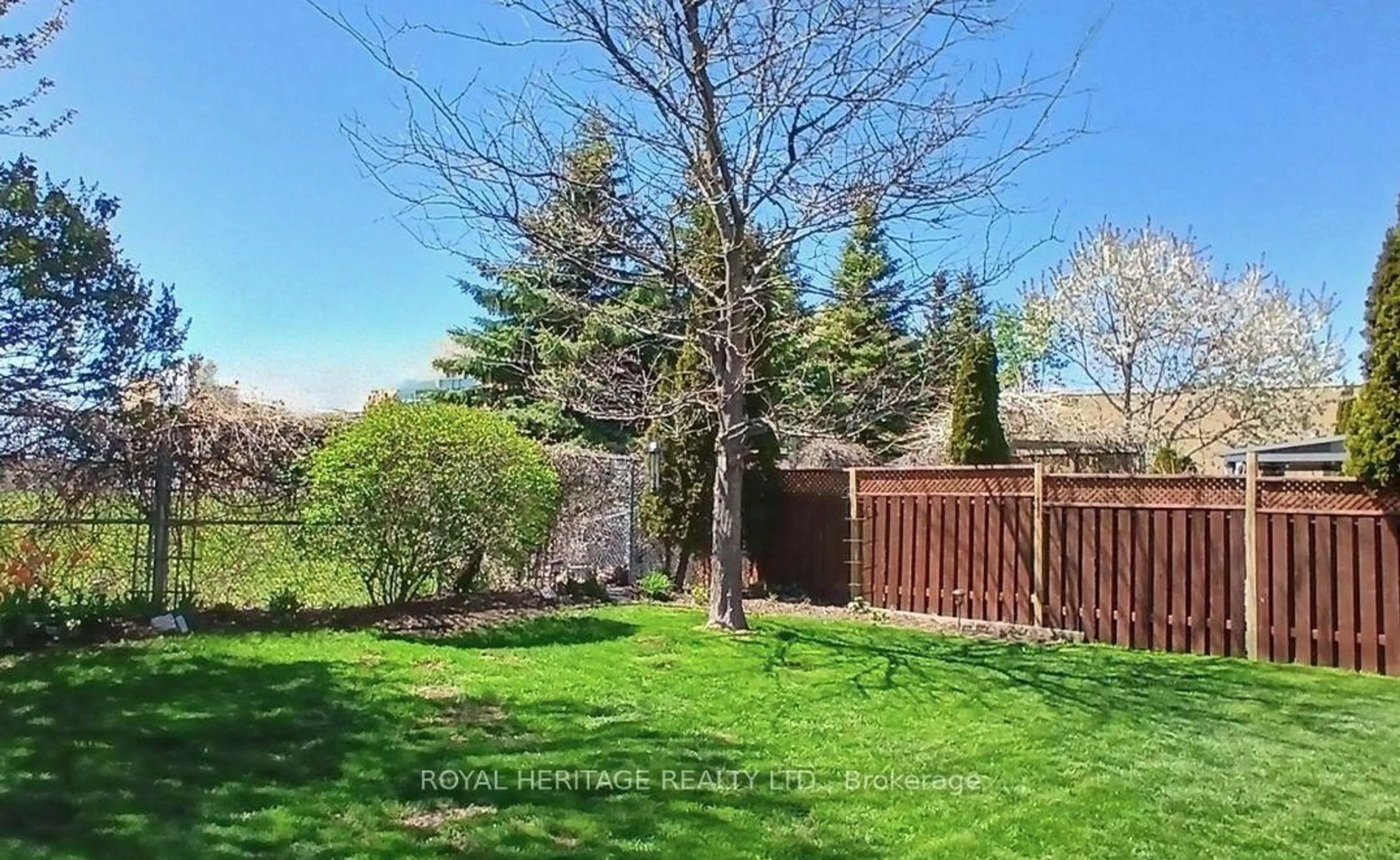 A pic from outside/outdoor area/front of a property/back of a property/a pic from drone, forest/trees view for 1588 Arborwood Dr, Oshawa Ontario L1K 2R4
