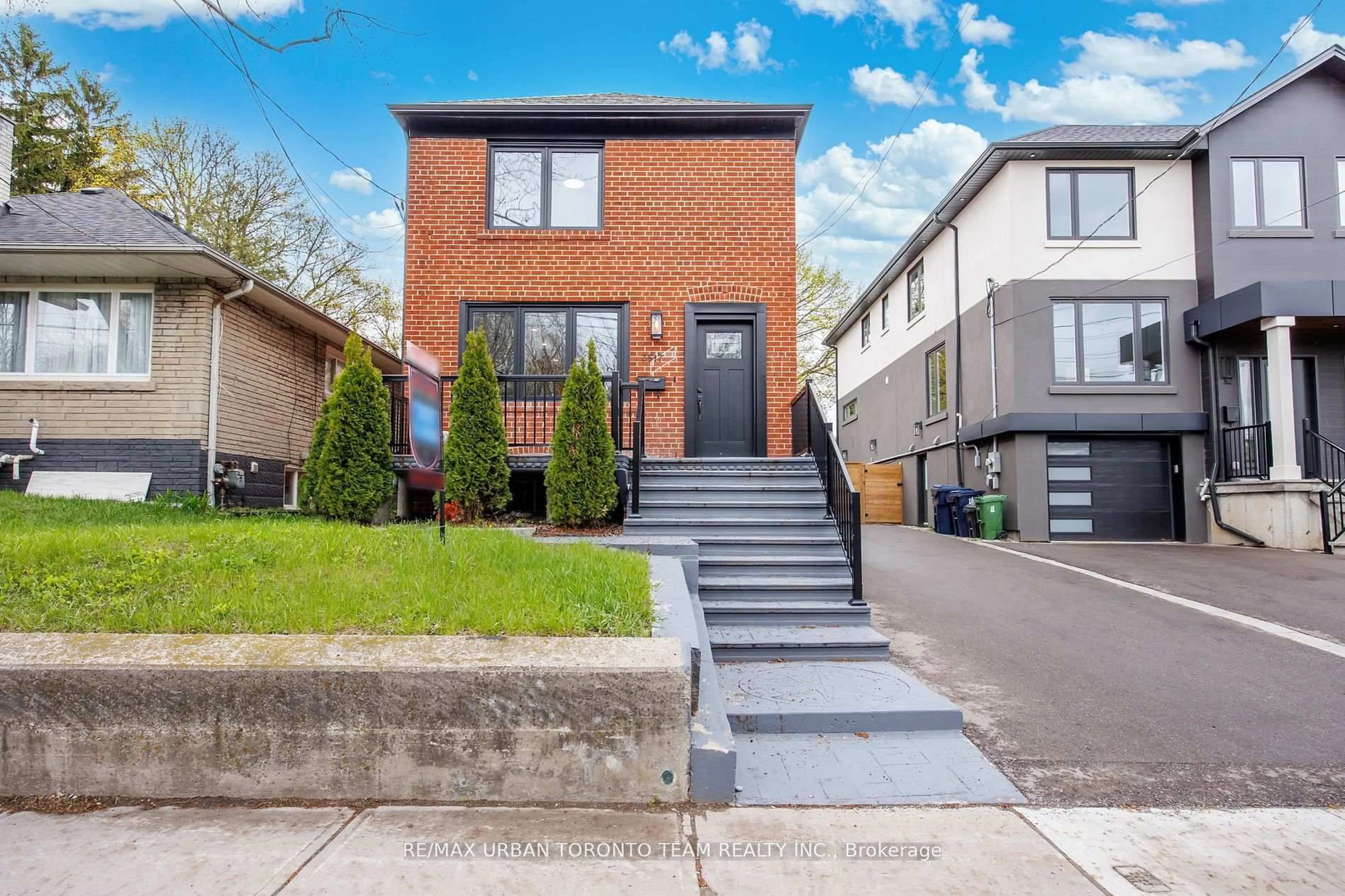 Home with brick exterior material, street for 3517 St Clair Ave, Toronto Ontario M1K 1L4