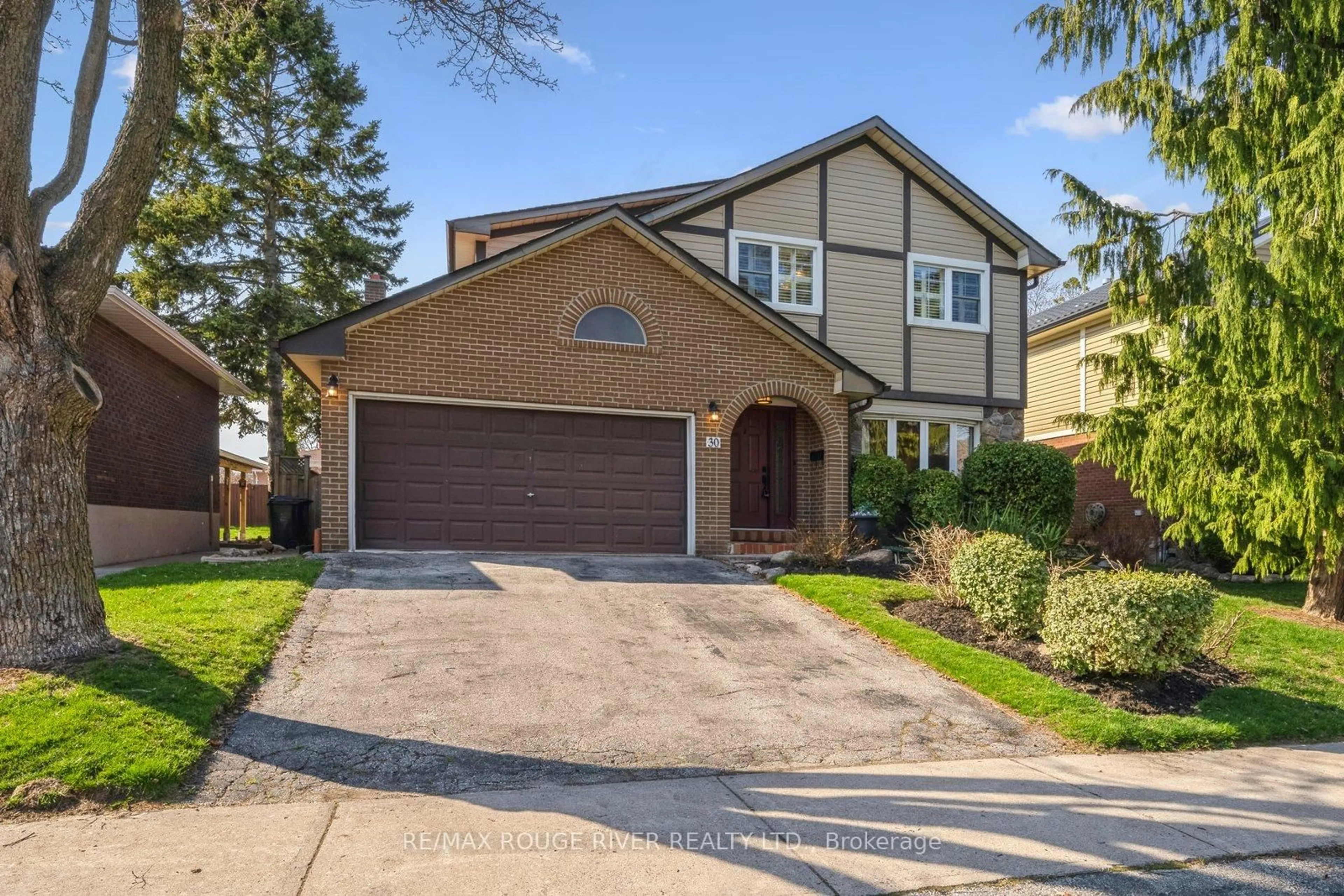 Home with brick exterior material, street for 30 Elkwood Dr, Toronto Ontario M1C 2C1