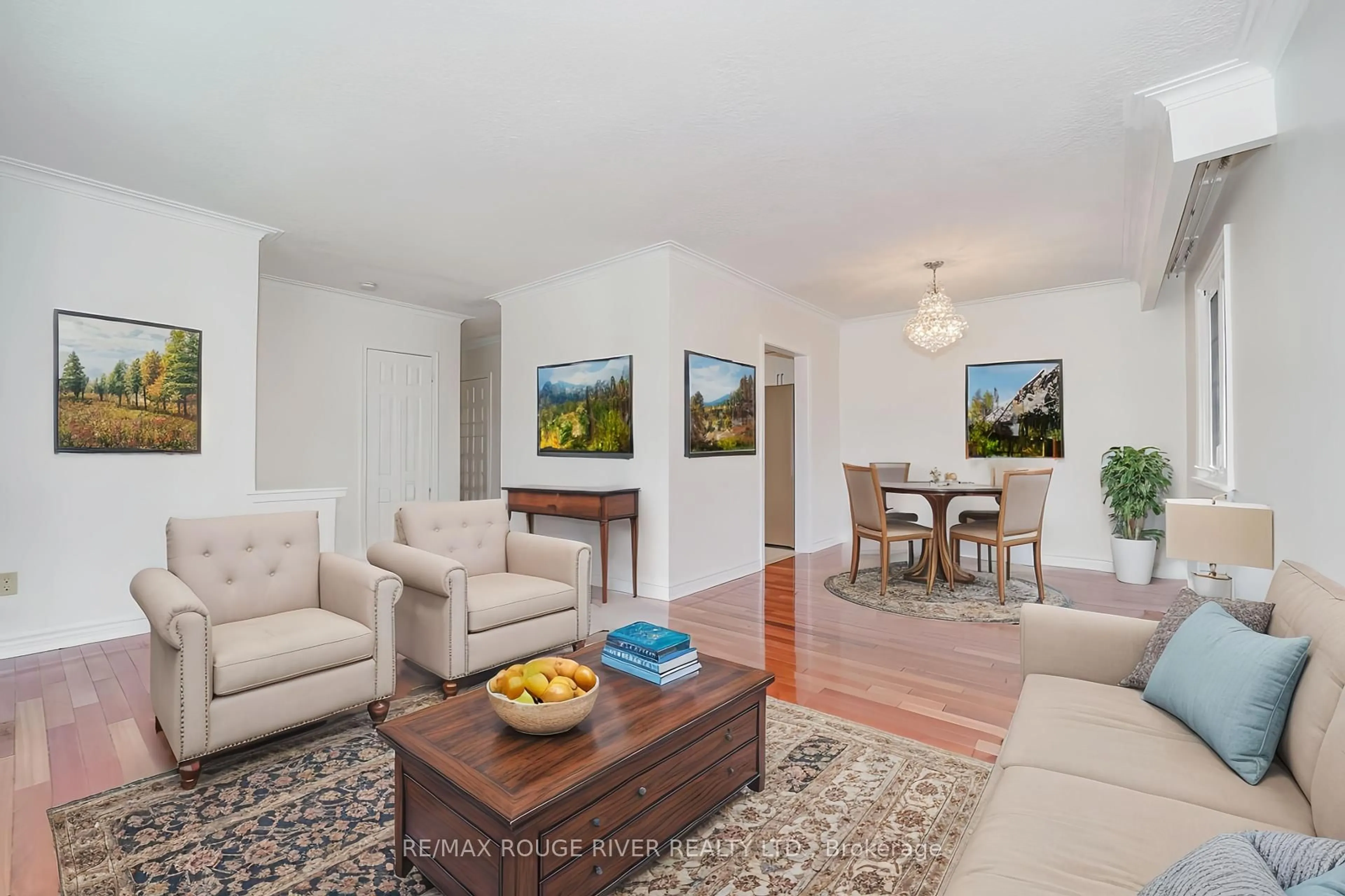 Living room with furniture, wood/laminate floor for 68 Greenock Ave, Toronto Ontario M1G 2Z9