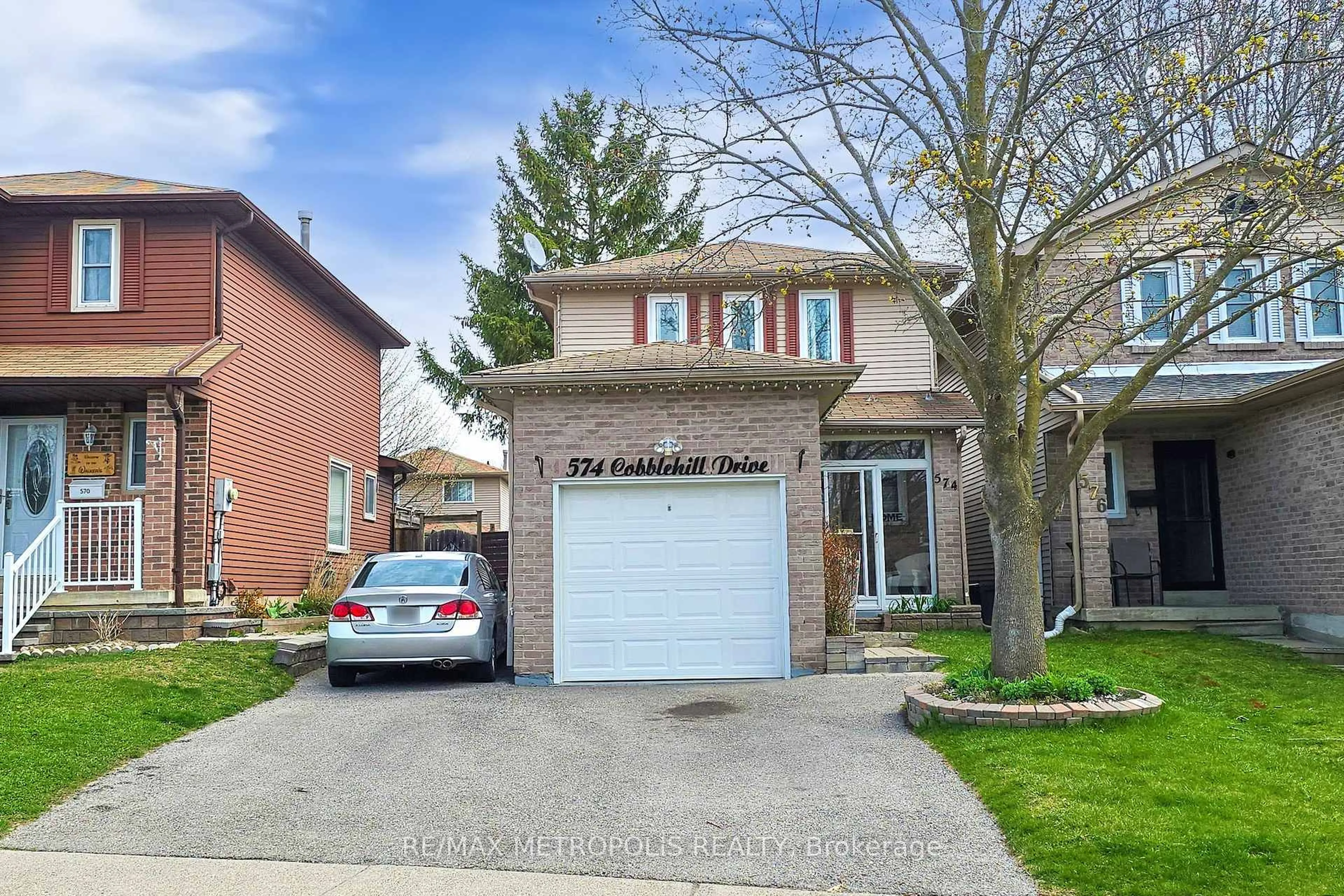 Home with brick exterior material, street for 574 Cobblehill Dr, Oshawa Ontario L1K 1R4