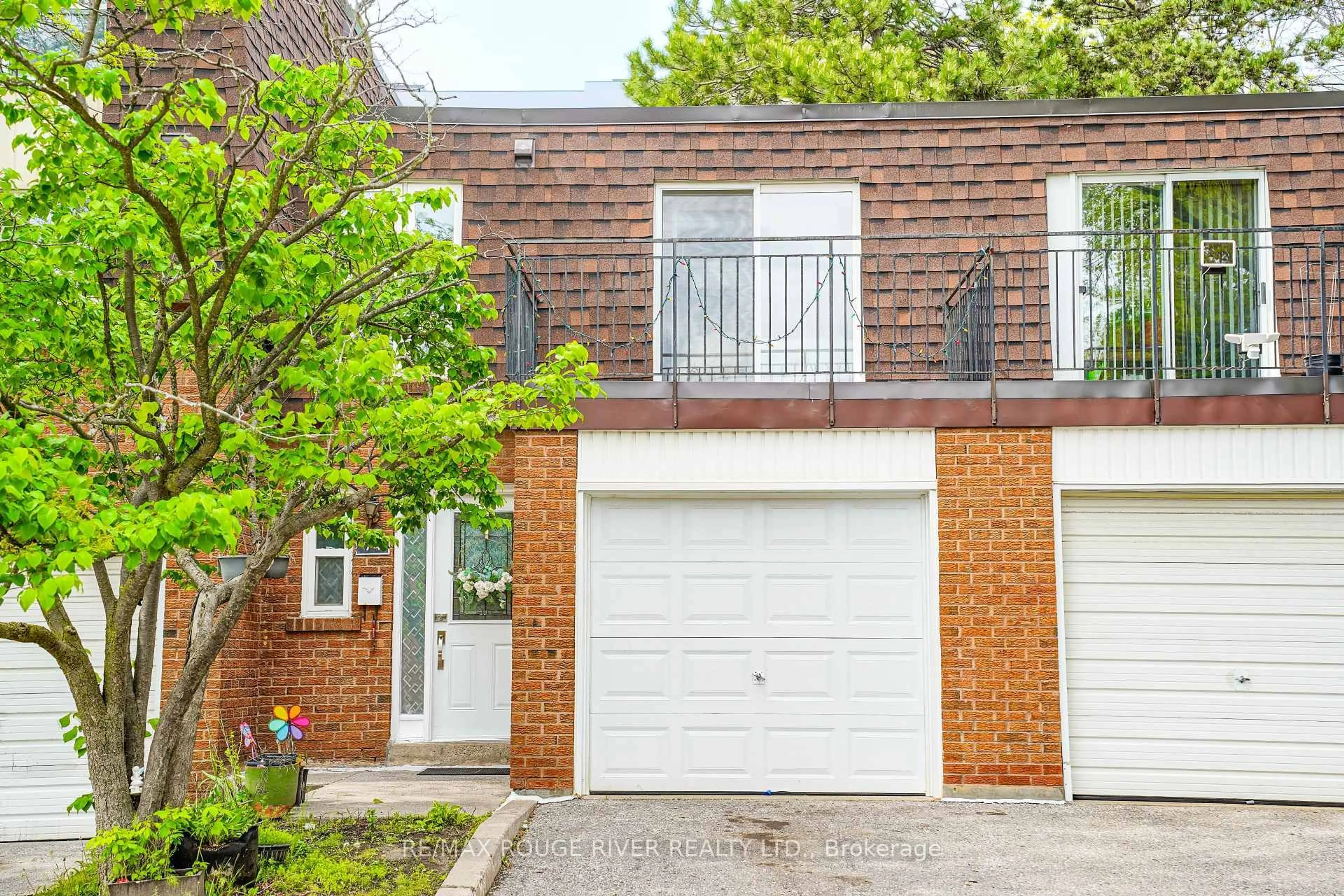 Home with brick exterior material, street for 100 Bridletowne Circ #74, Toronto Ontario M1W 2G8