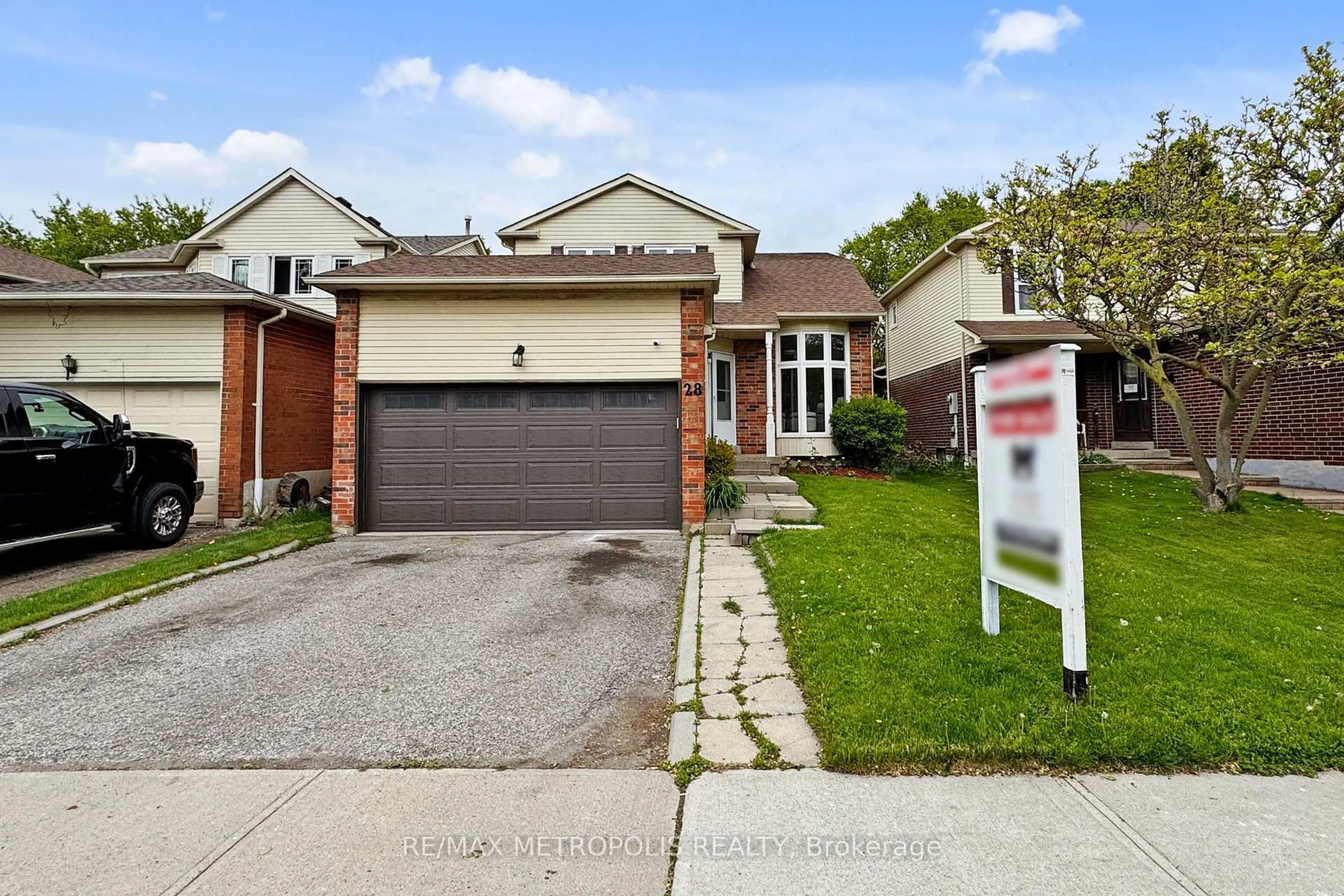 Home with brick exterior material, street for 28 Reed Dr, Ajax Ontario L1S 5S1