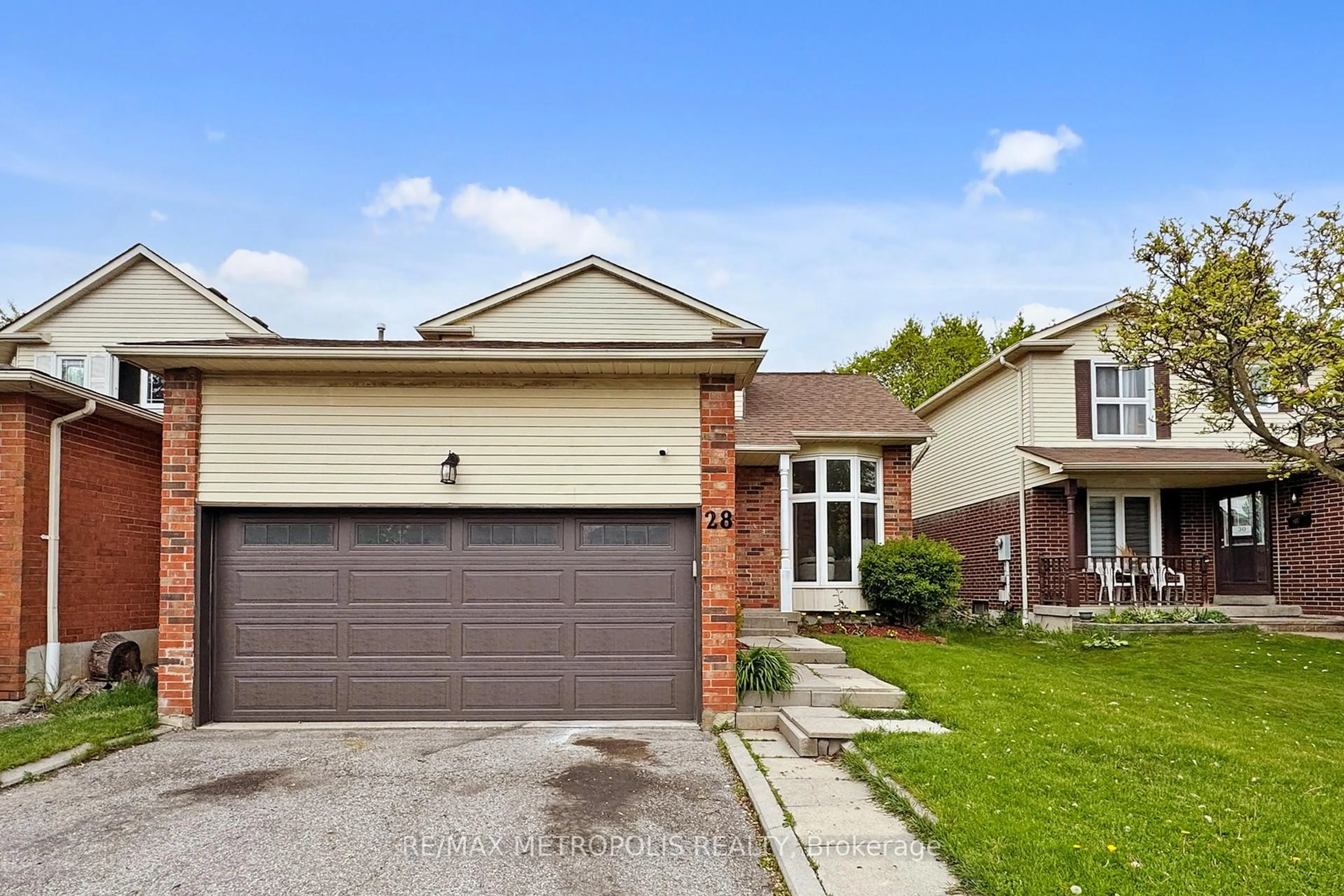 Home with brick exterior material, street for 28 Reed Dr, Ajax Ontario L1S 5S1