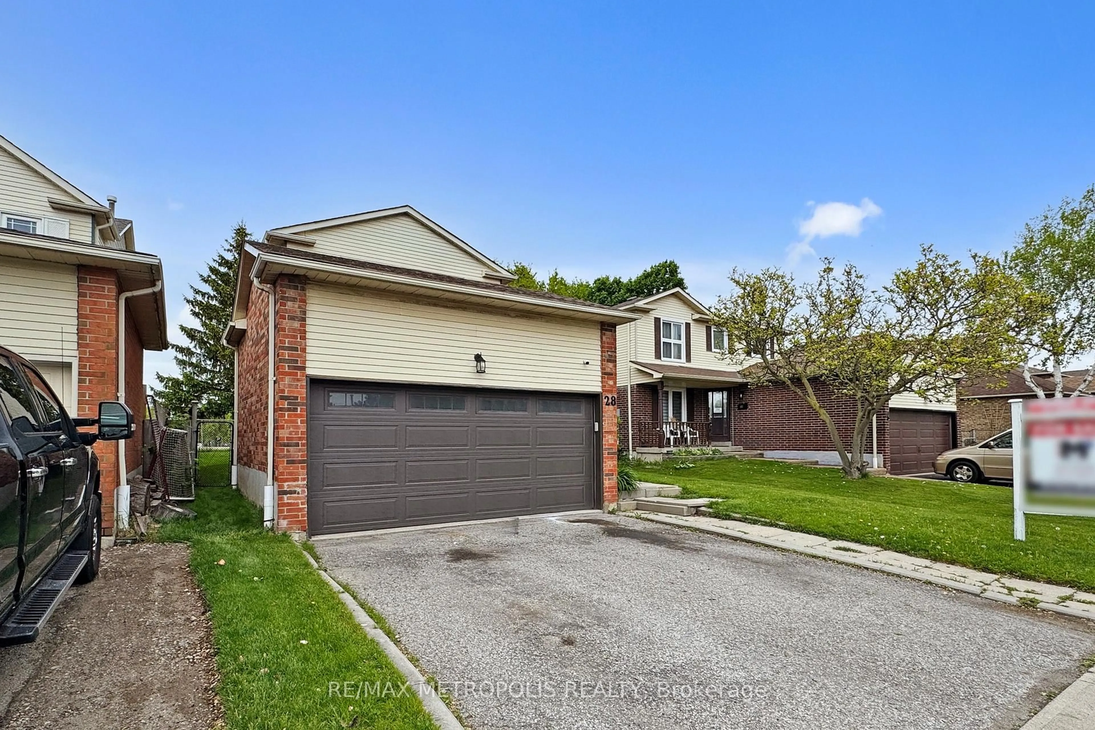 Home with brick exterior material, street for 28 Reed Dr, Ajax Ontario L1S 5S1