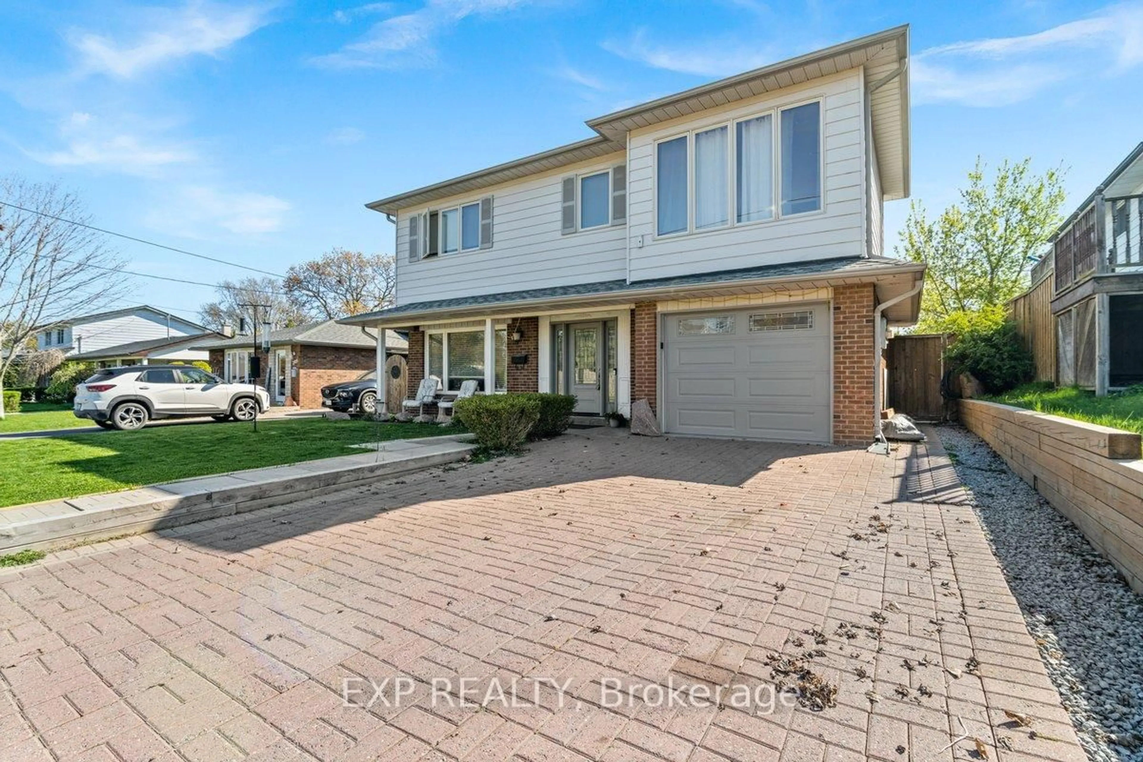 Home with brick exterior material, street for 203 Stewart St, Whitby Ontario L1N 3V2