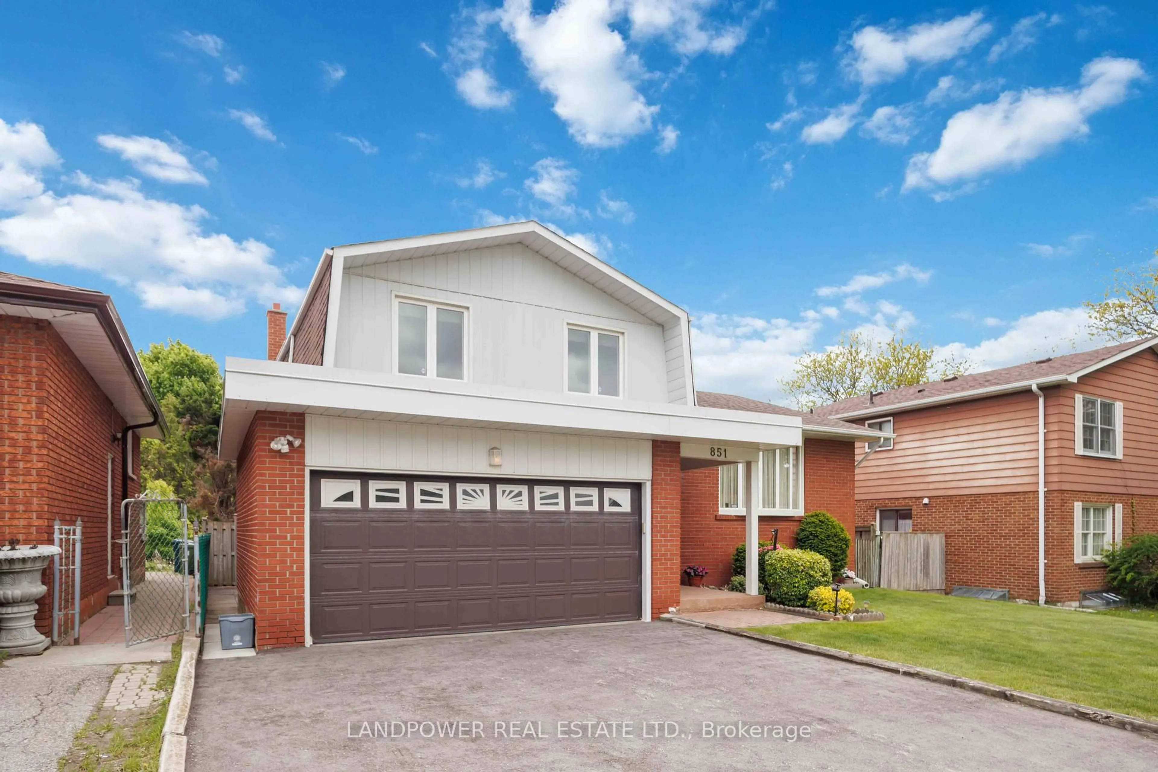 Home with brick exterior material, street for 851 Huntingwood Dr, Toronto Ontario M1T 3L7