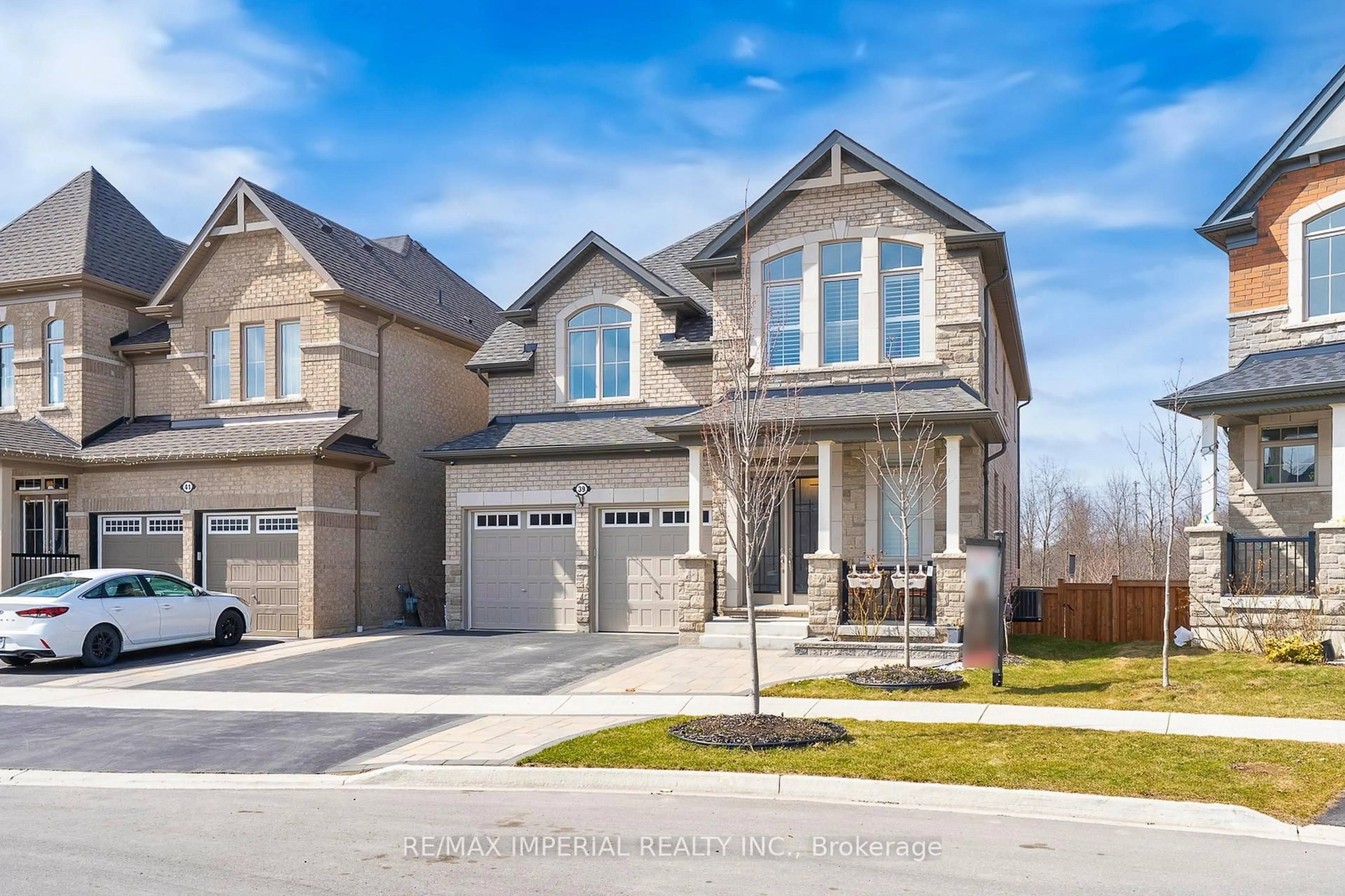 Home with brick exterior material, street for 39 Olerud Dr, Whitby Ontario L1P 0J1