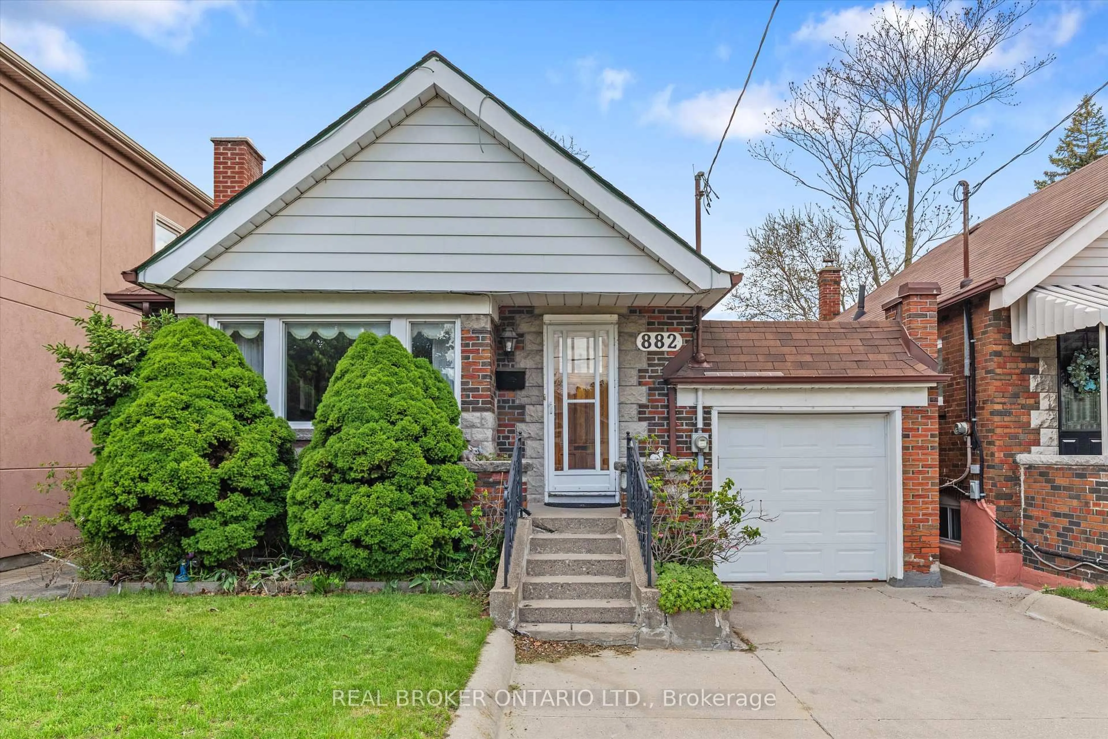 Home with brick exterior material, street for 882 Coxwell Ave, Toronto Ontario M4C 3G2