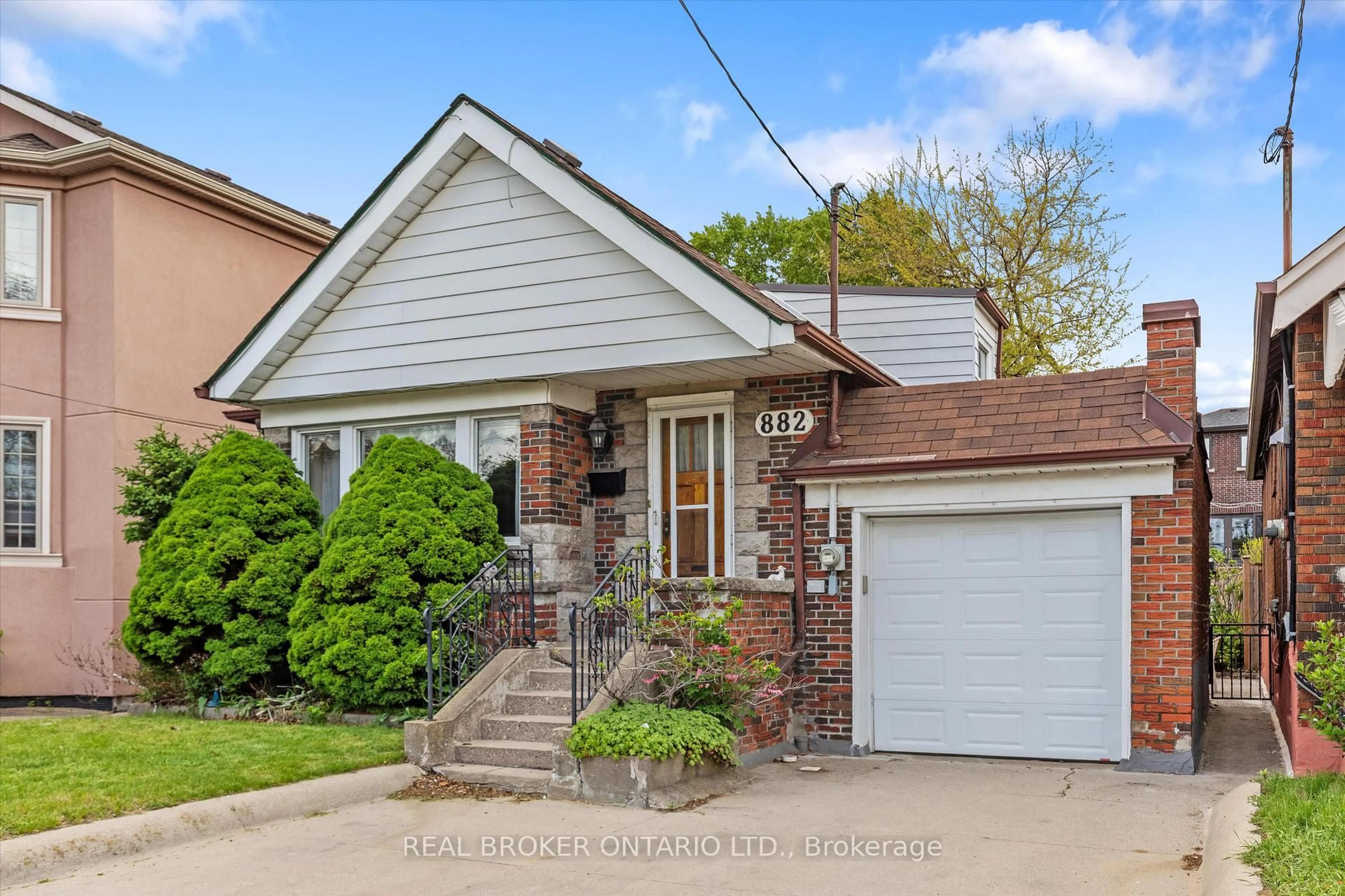 Home with brick exterior material, street for 882 Coxwell Ave, Toronto Ontario M4C 3G2