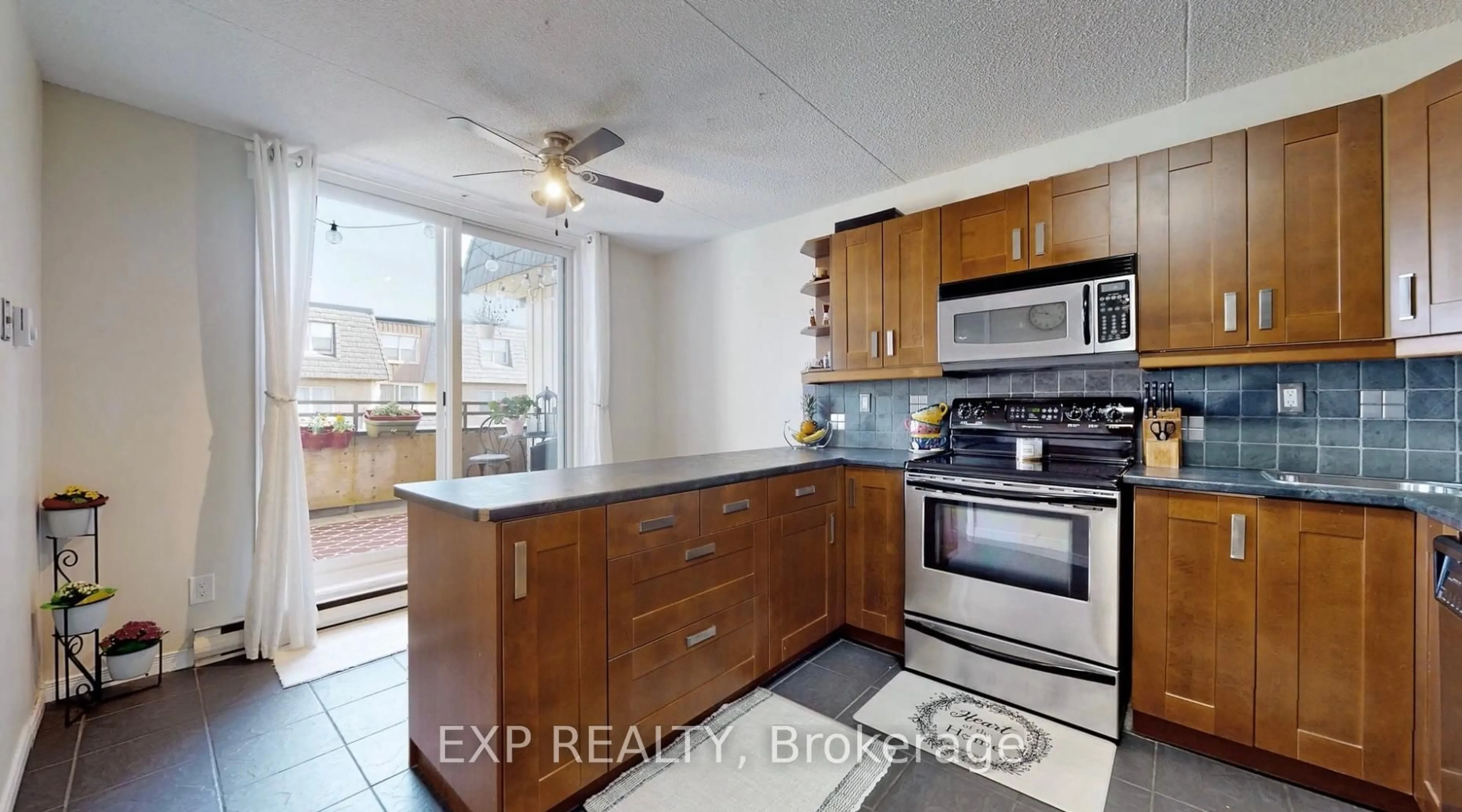 Standard kitchen, ceramic/tile floor for 580 Mary St #214, Whitby Ontario L1N 2R3