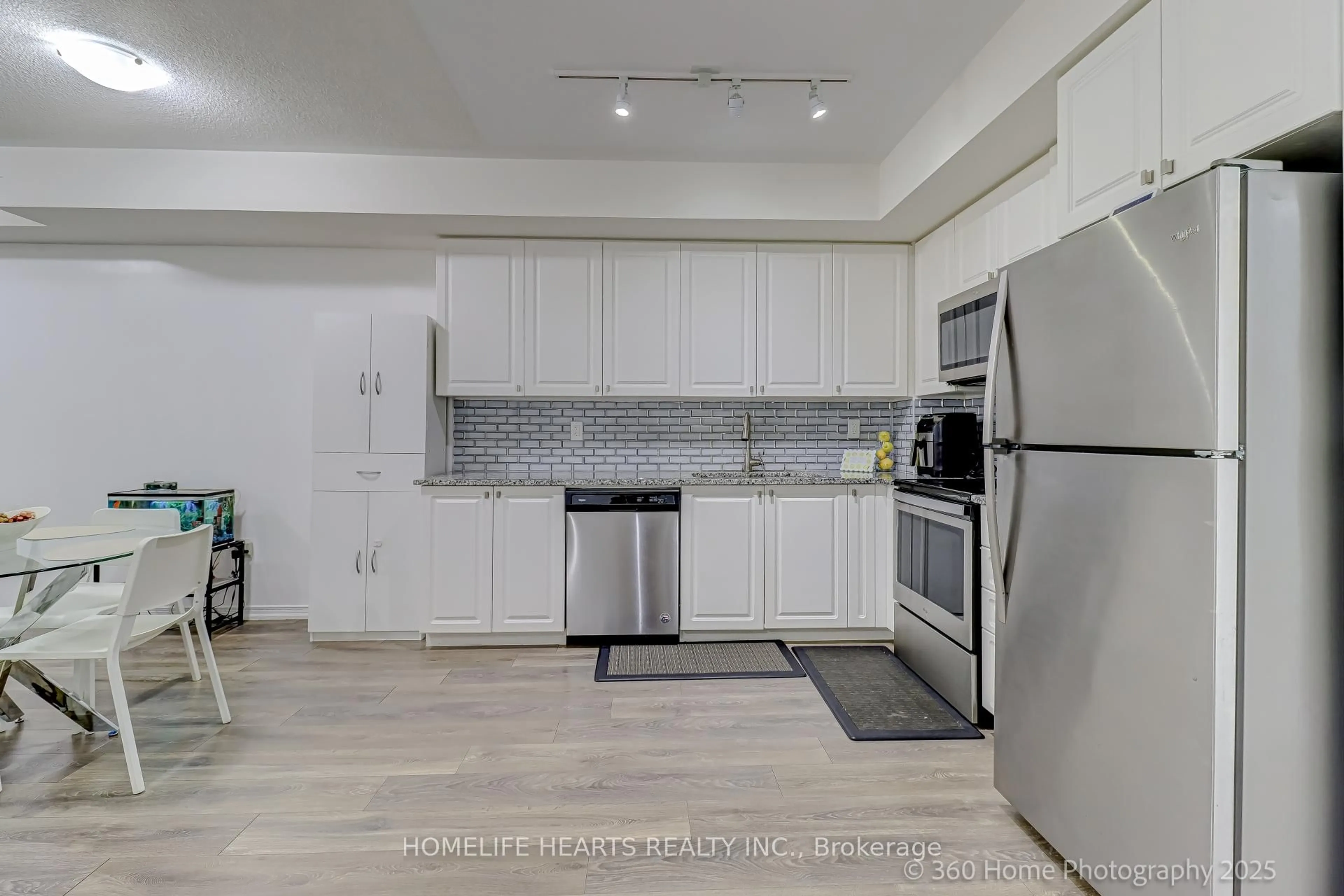 Open concept kitchen, ceramic/tile floor for 8825 Sheppard Ave #106, Toronto Ontario M1B 0E3