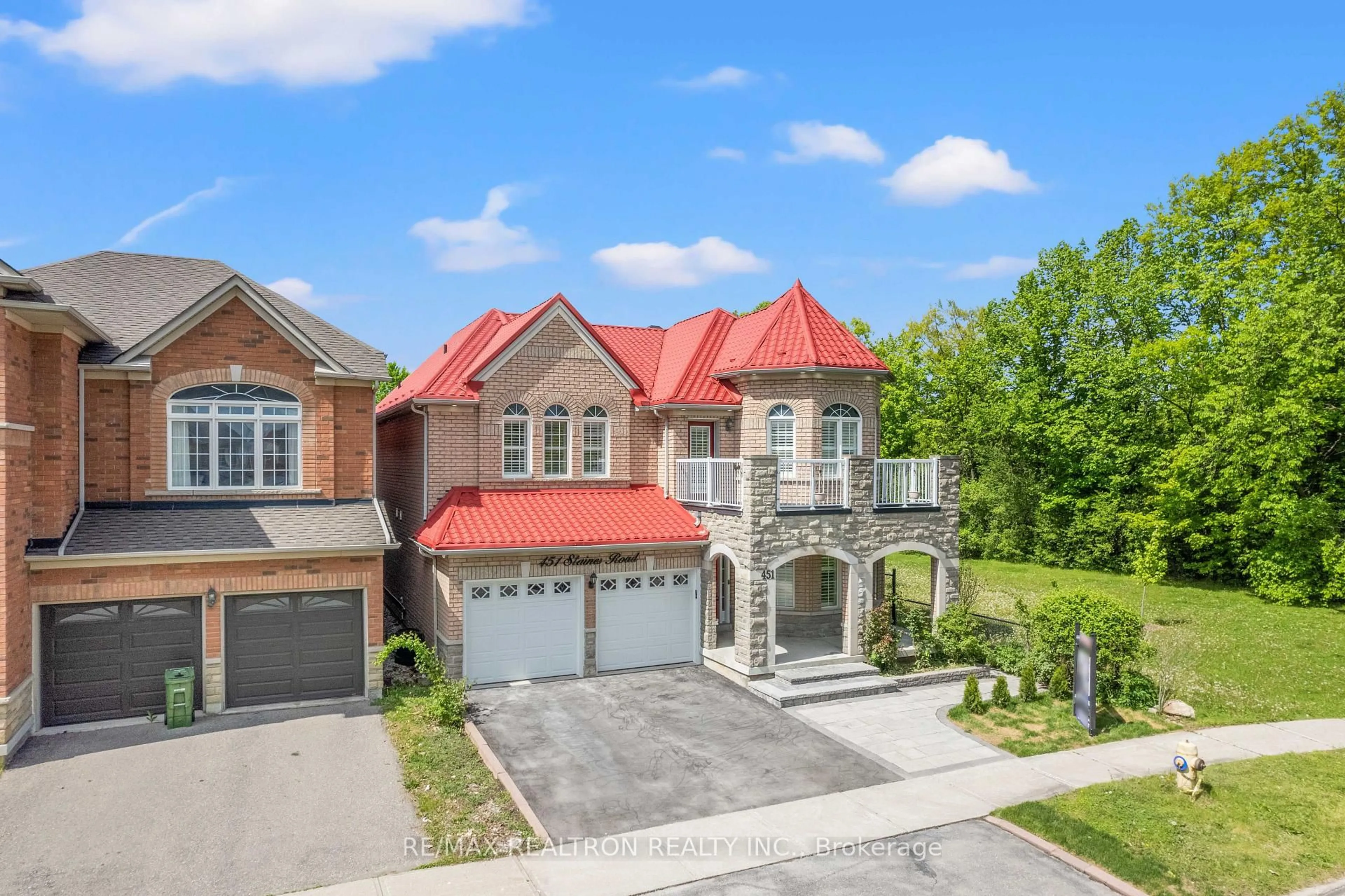 A pic from outside/outdoor area/front of a property/back of a property/a pic from drone, street for 451 Staines Rd, Toronto Ontario M1X 2B9