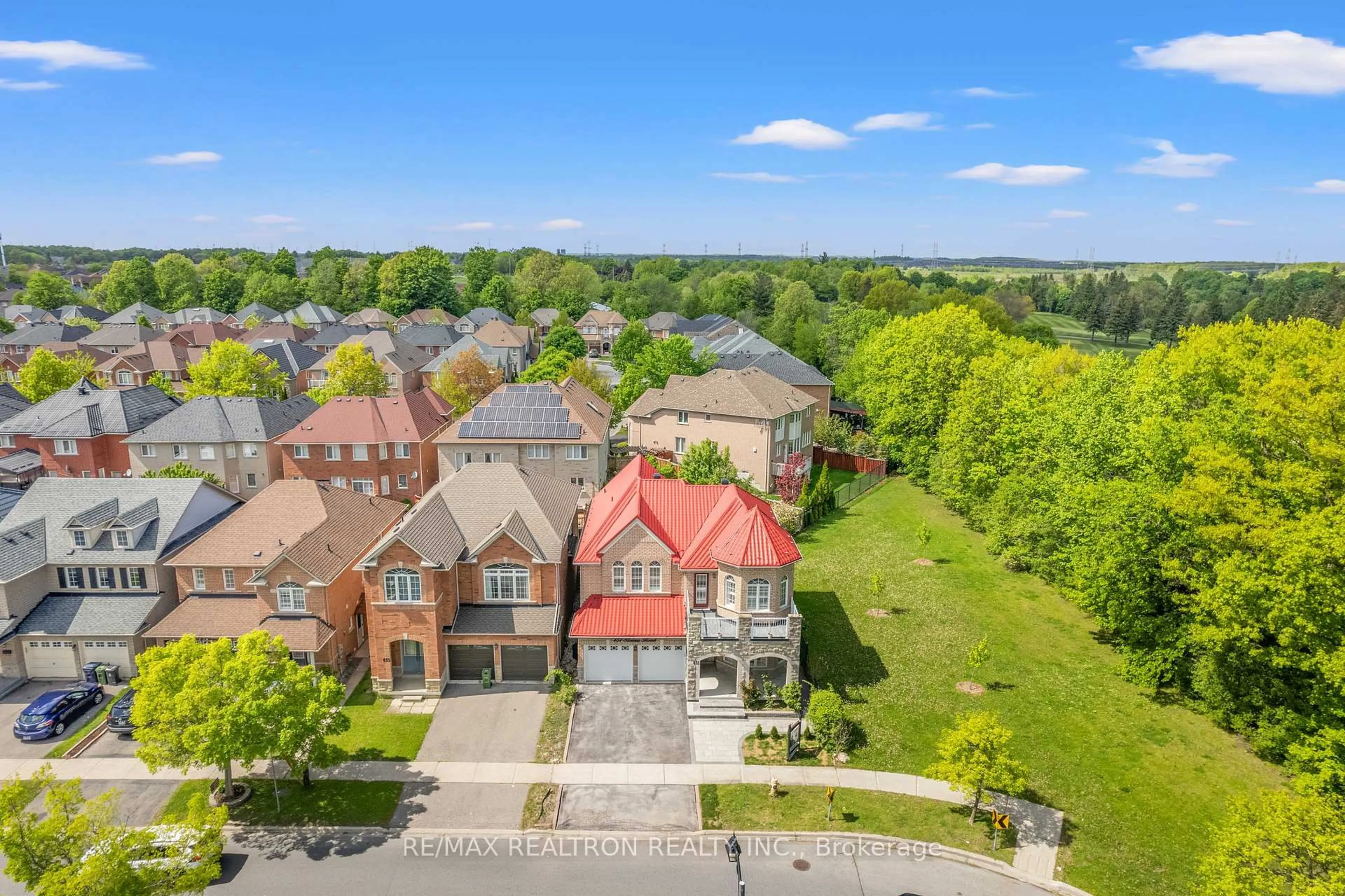 A pic from outside/outdoor area/front of a property/back of a property/a pic from drone, street for 451 Staines Rd, Toronto Ontario M1X 2B9