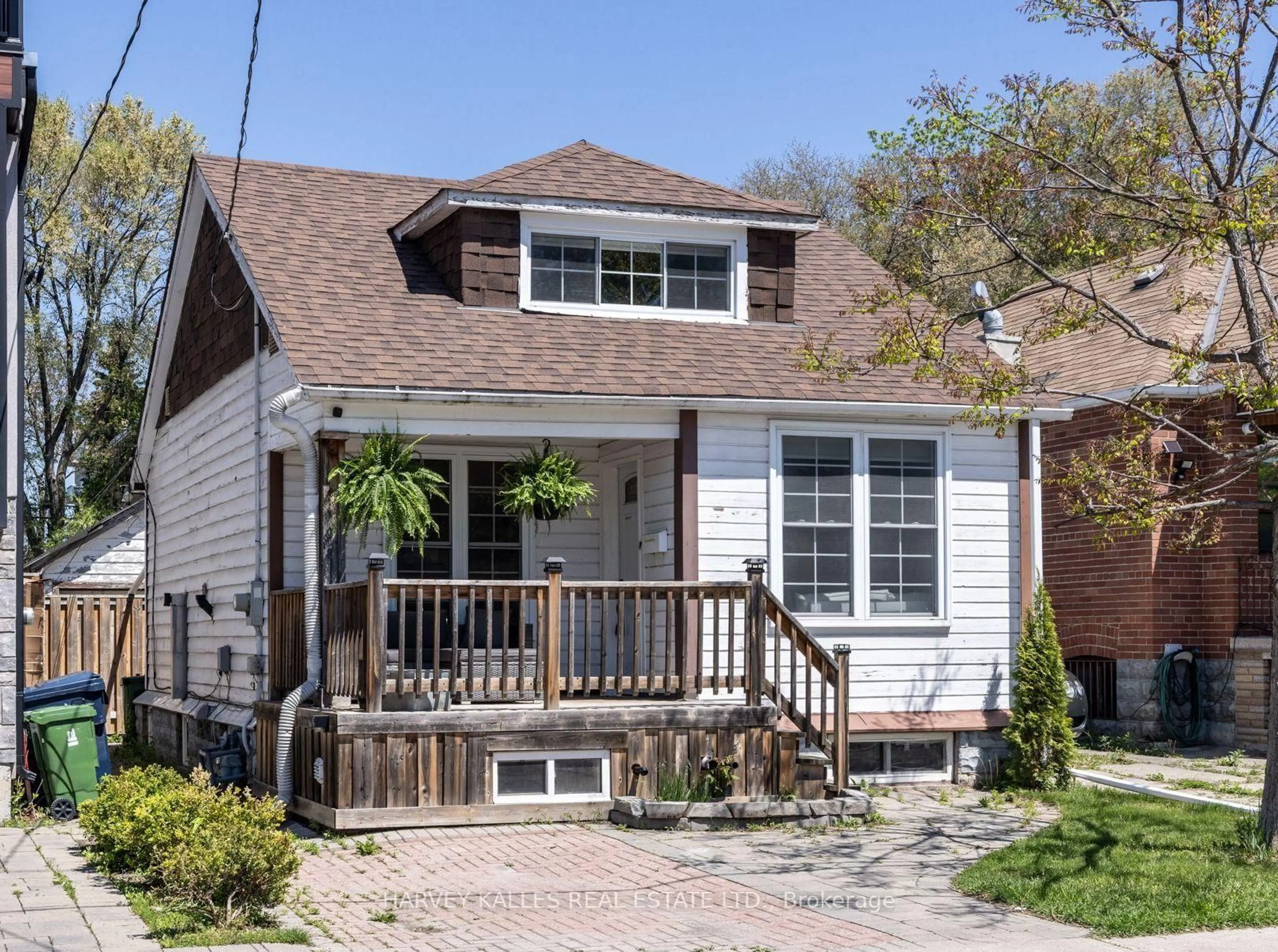 Home with vinyl exterior material, street for 210 Gowan Ave, Toronto Ontario M4J 2K6
