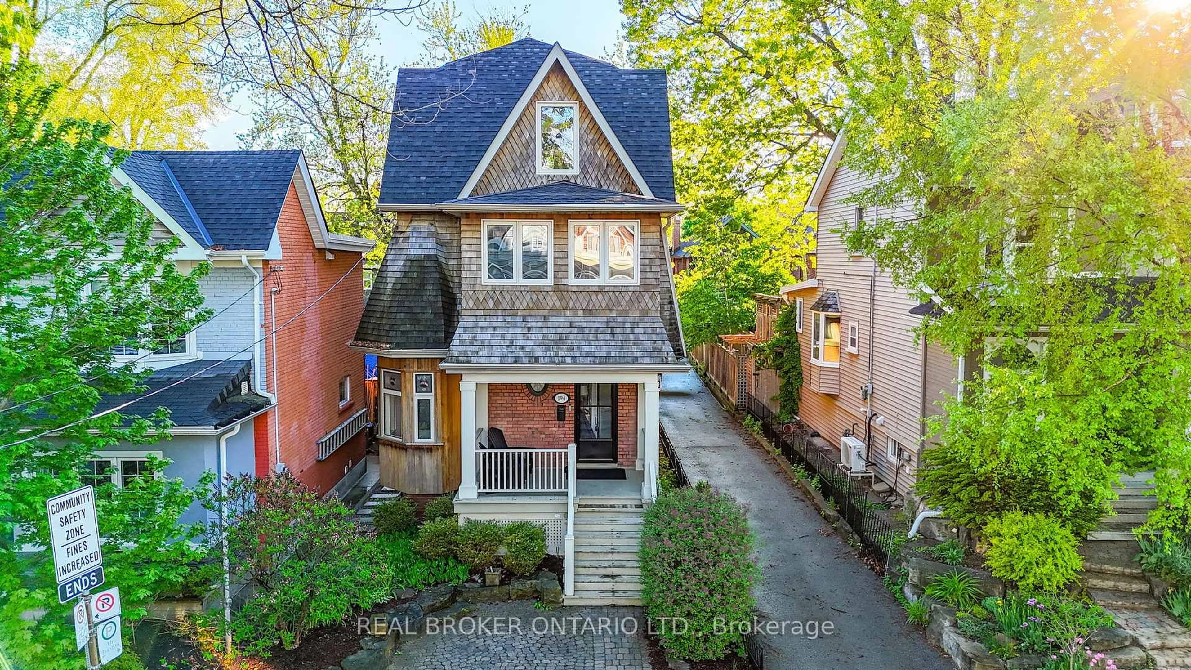 Home with brick exterior material, street for 194 Lee Ave, Toronto Ontario M4E 2P3