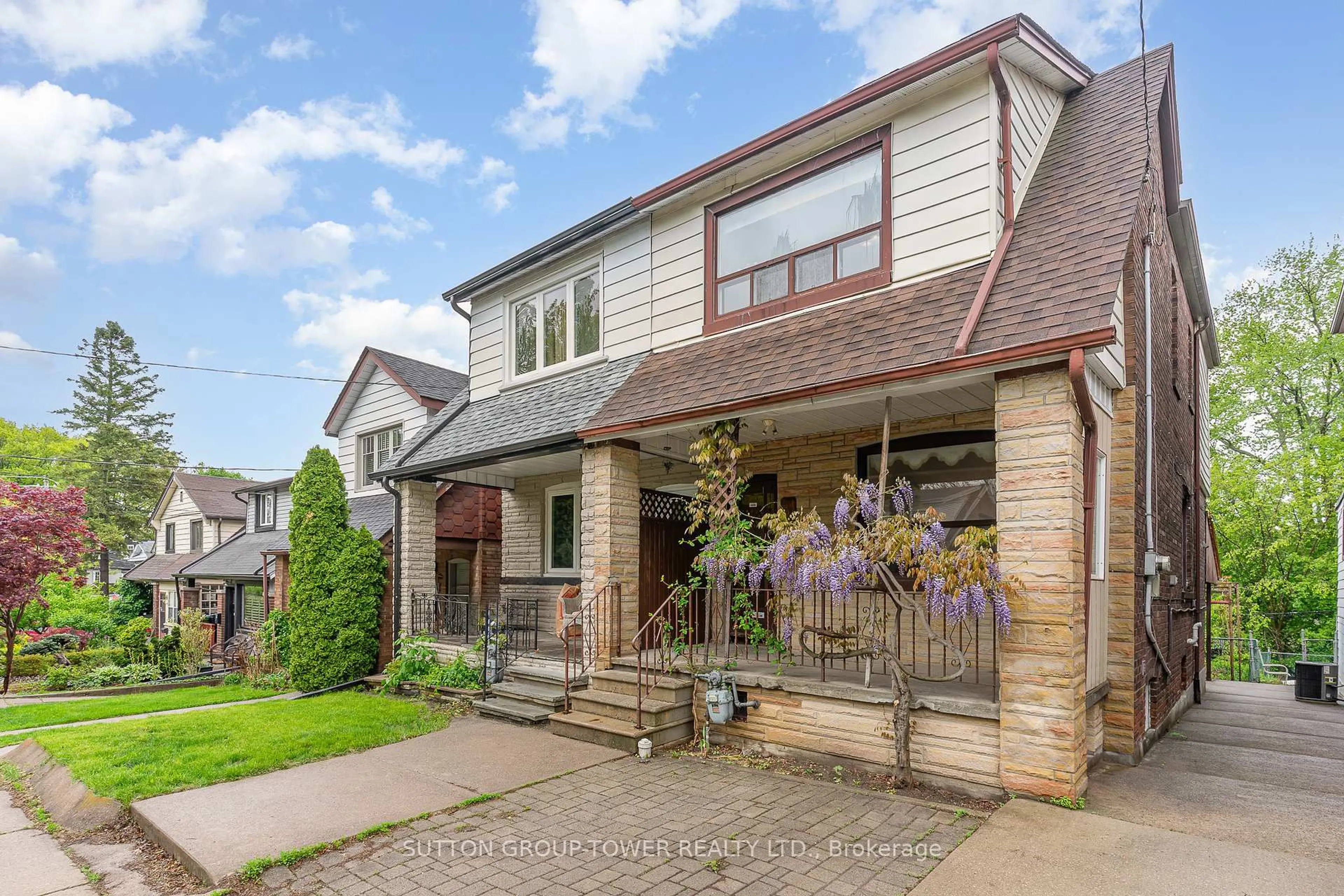 Home with brick exterior material, street for 50 East Lynn Ave, Toronto Ontario M4C 3X2