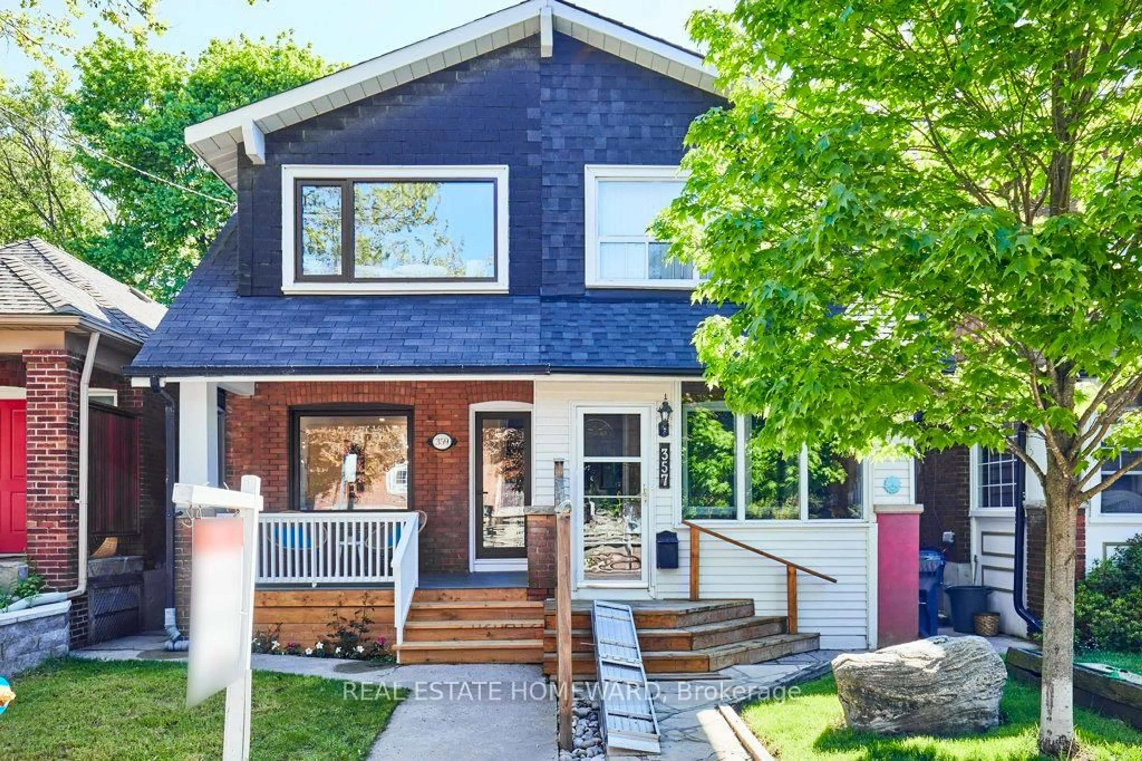 Home with brick exterior material, street for 359 Scarborough Rd, Toronto Ontario M4E 3N1