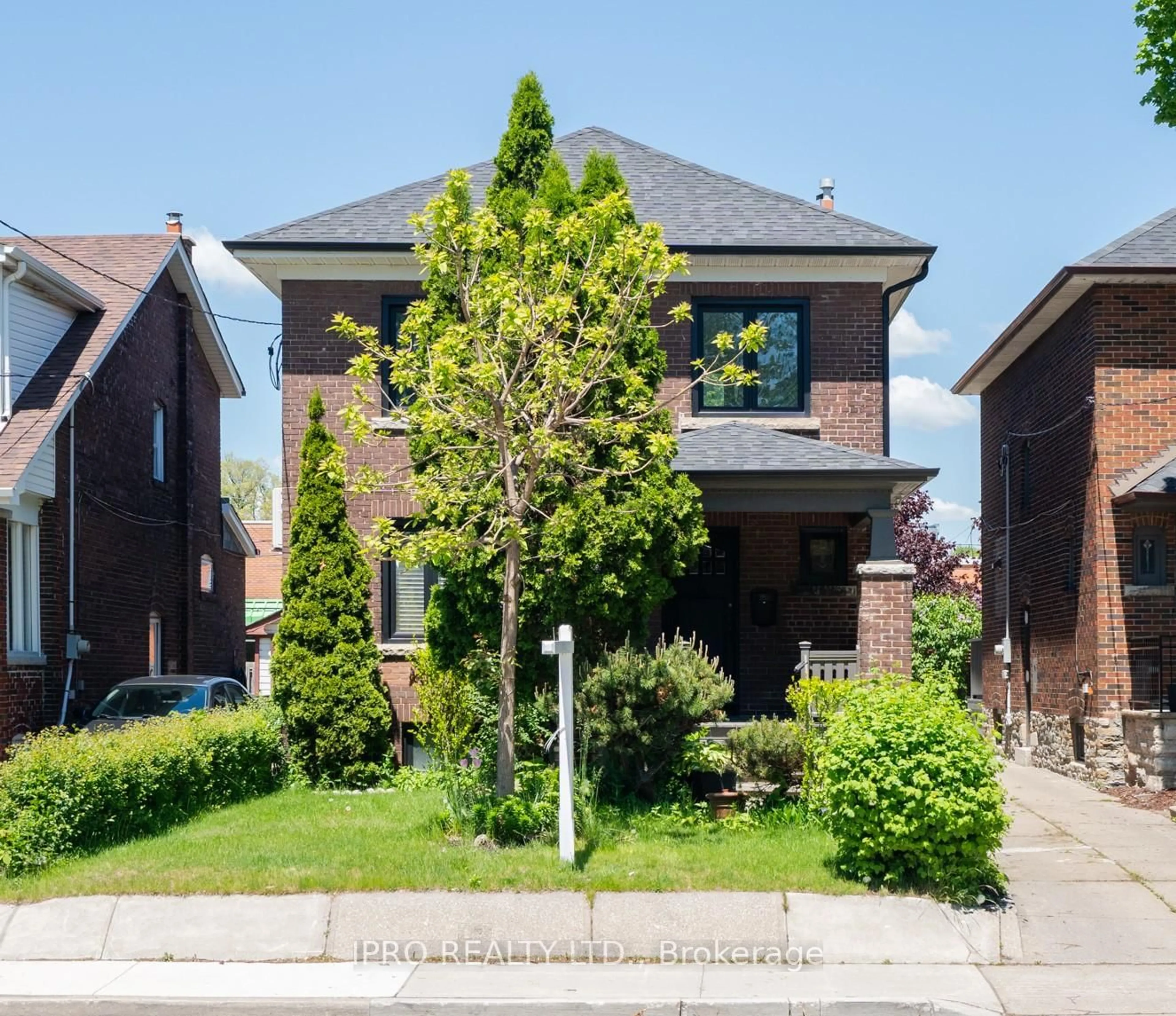 Home with brick exterior material, street for 12 Mortimer Ave, Toronto Ontario M4K 1Z8
