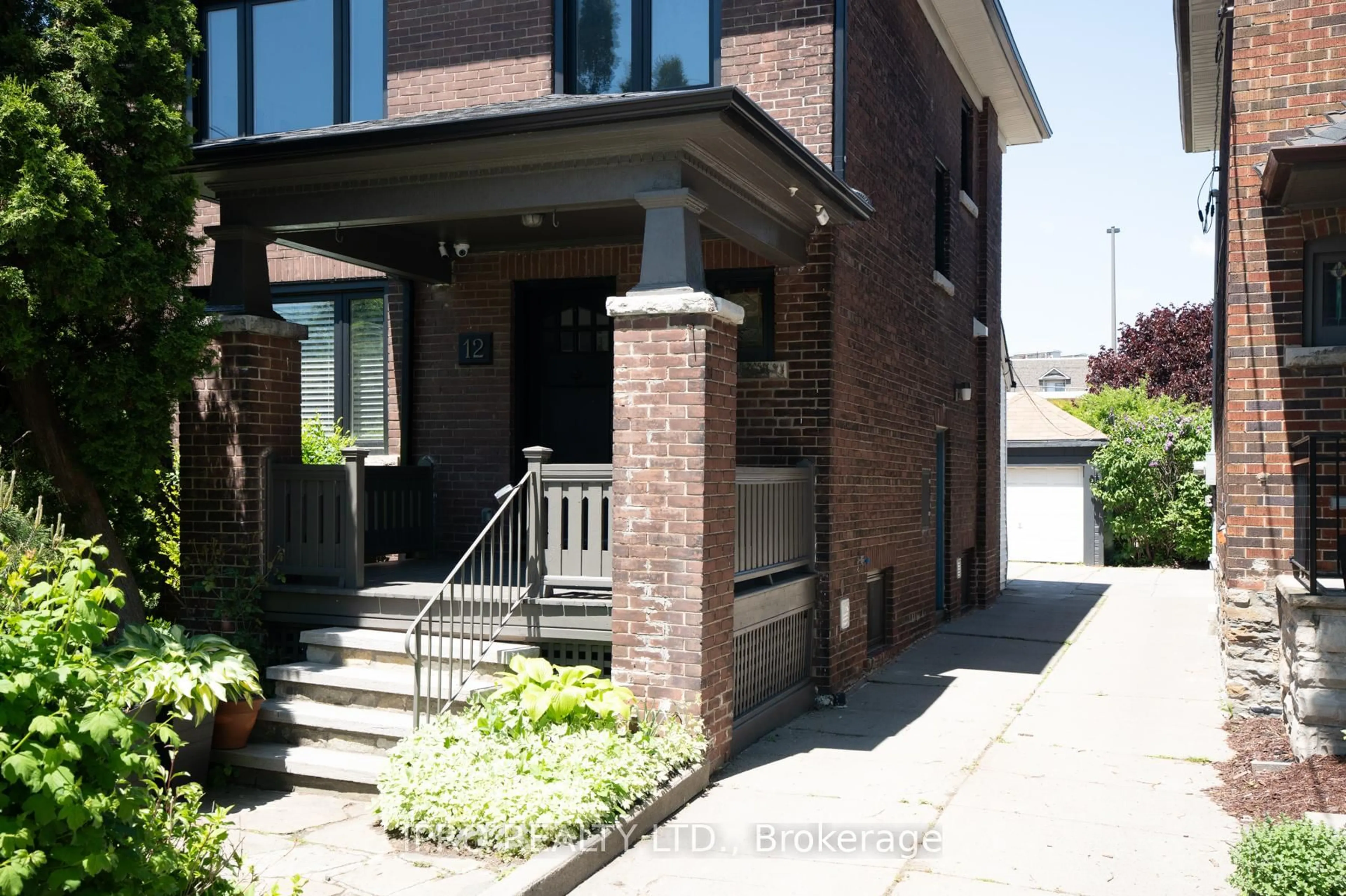 Home with brick exterior material, street for 12 Mortimer Ave, Toronto Ontario M4K 1Z8