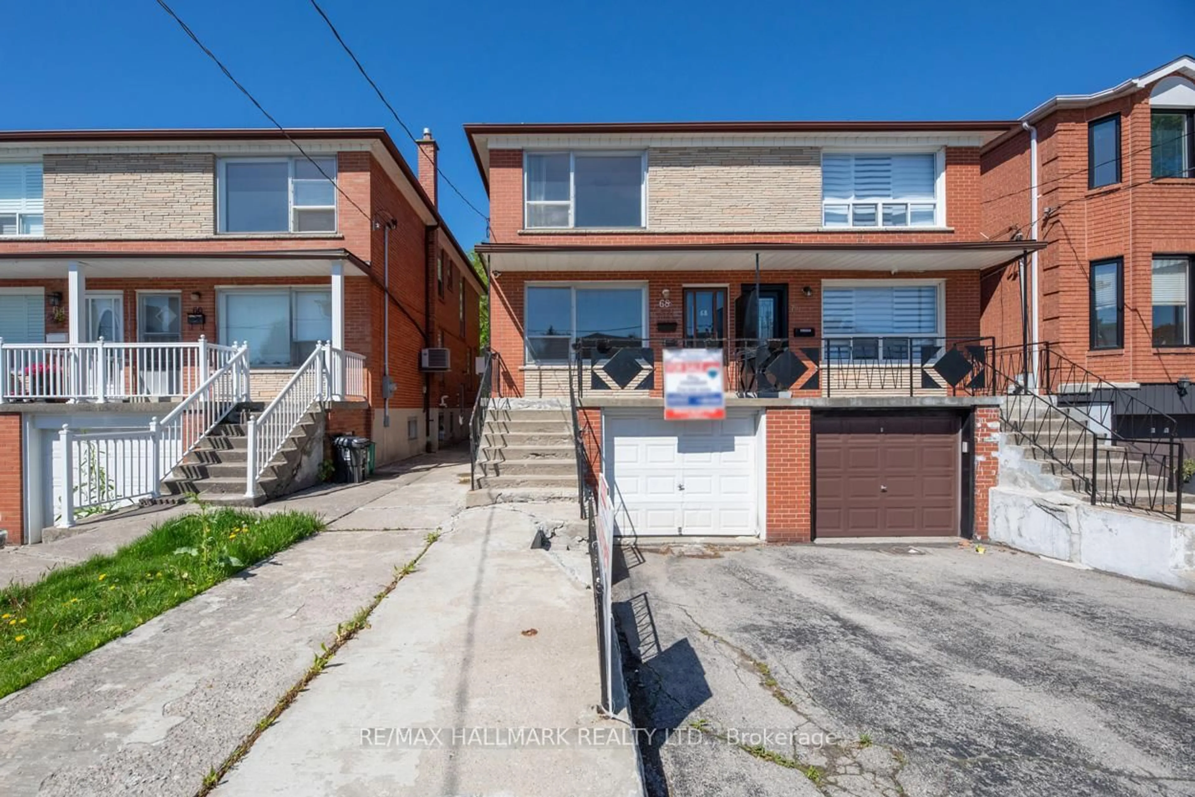Home with brick exterior material, street for 68 August Ave, Toronto Ontario M1L 3N2