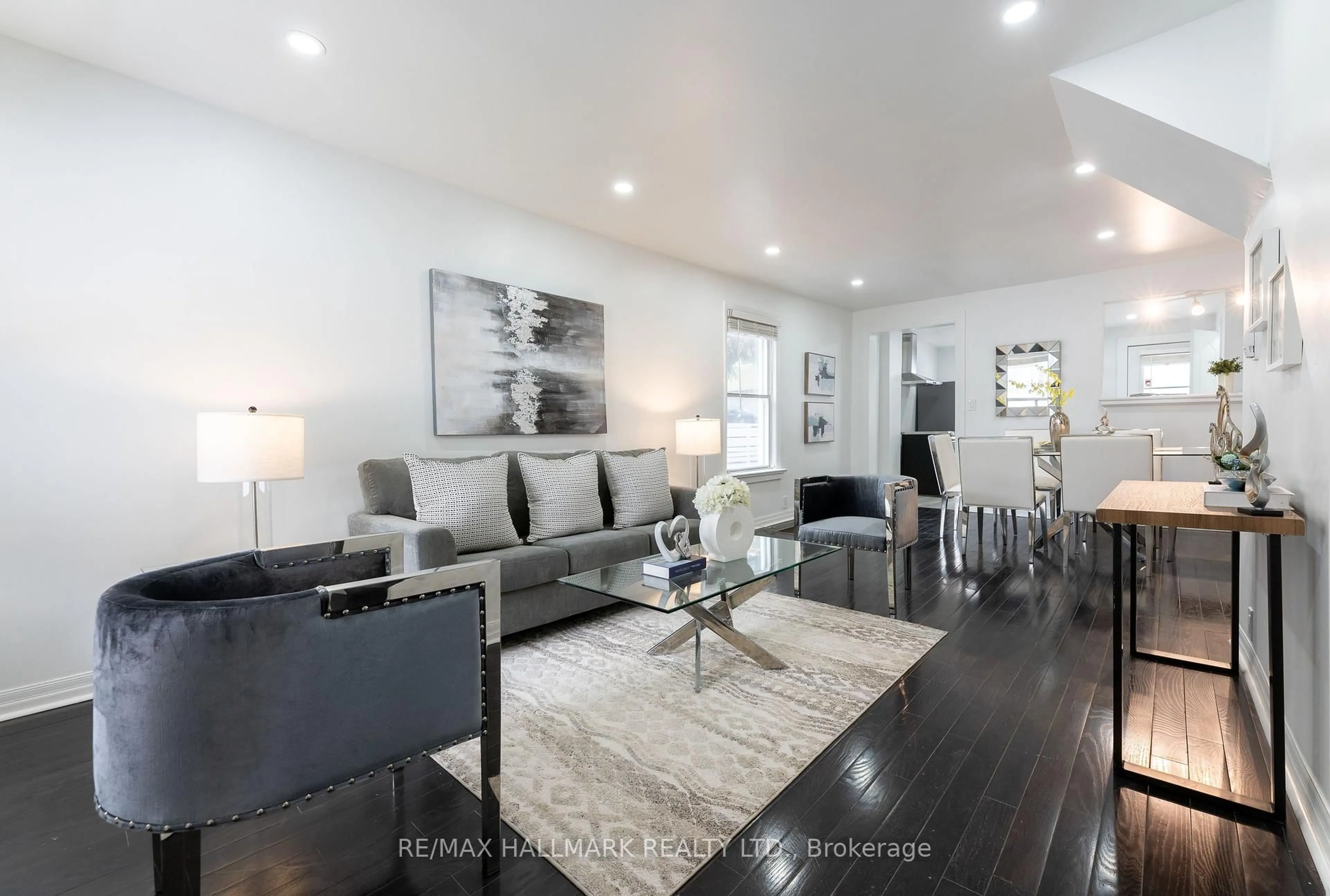 Living room with furniture, unknown for 106 Willow Ave, Toronto Ontario M4E 3K3