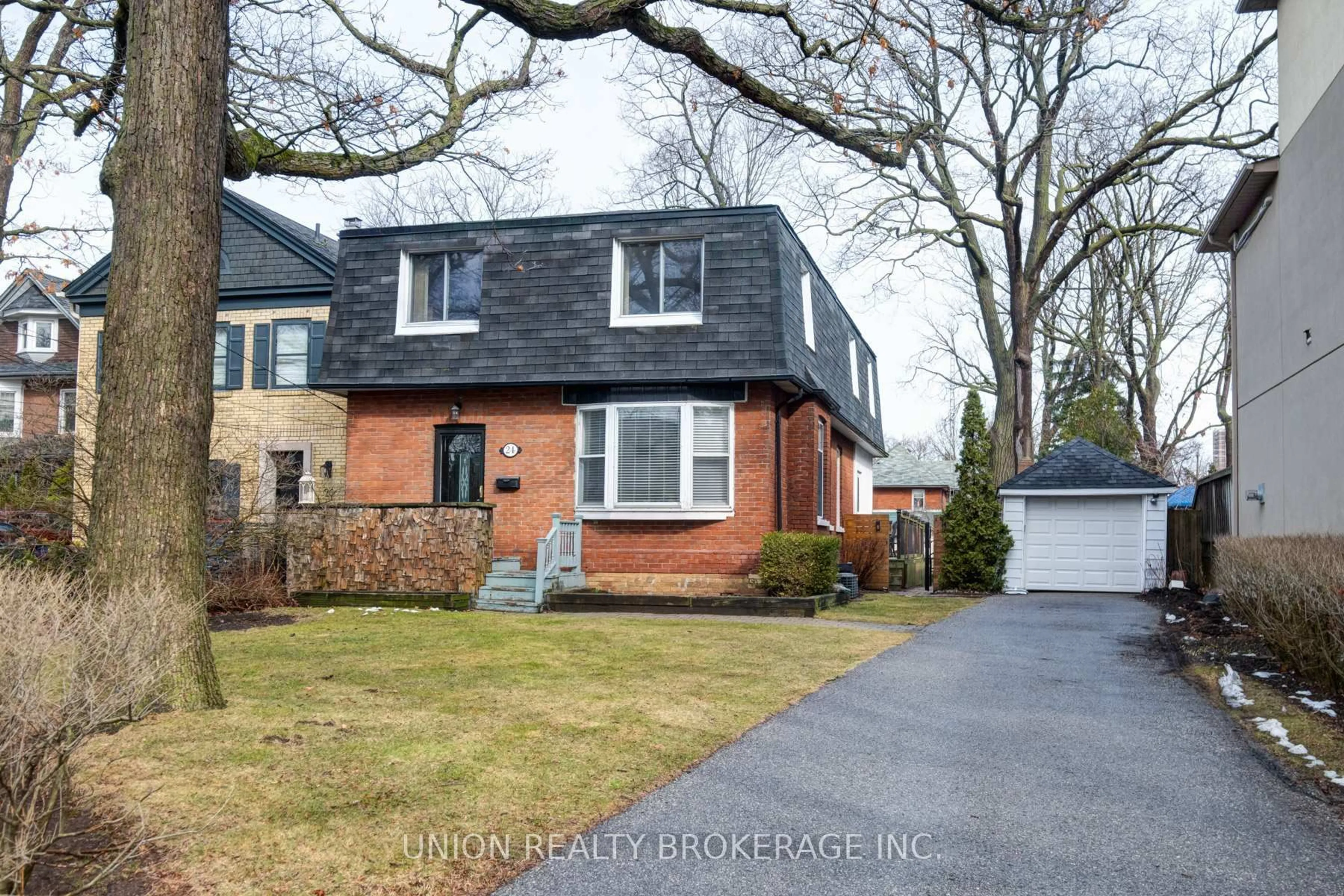 Home with brick exterior material, street for 24 Benlamond Ave, Toronto Ontario M4E 1Y9