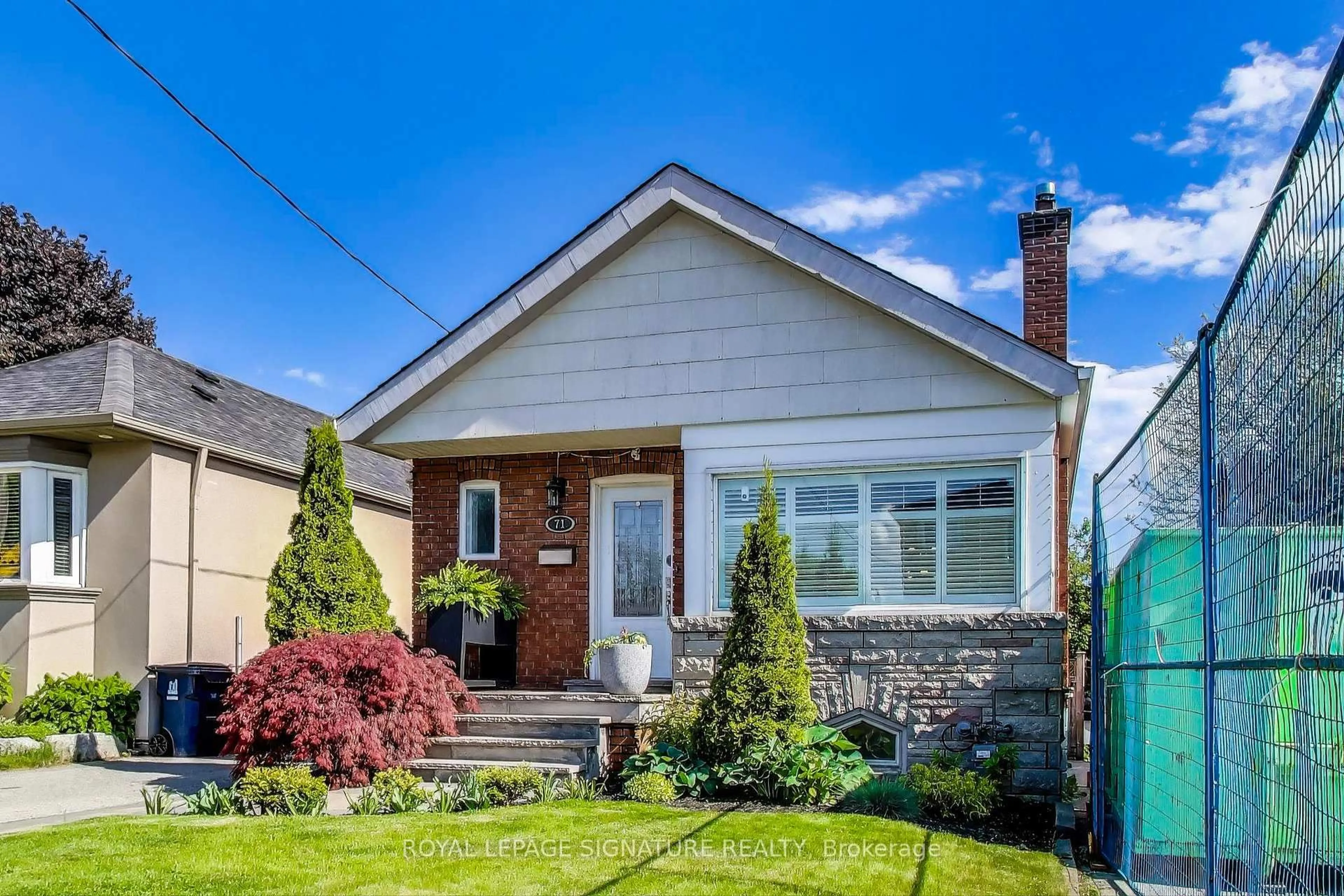 Home with brick exterior material, street for 71 Yardley Ave, Toronto Ontario M4B 2A9