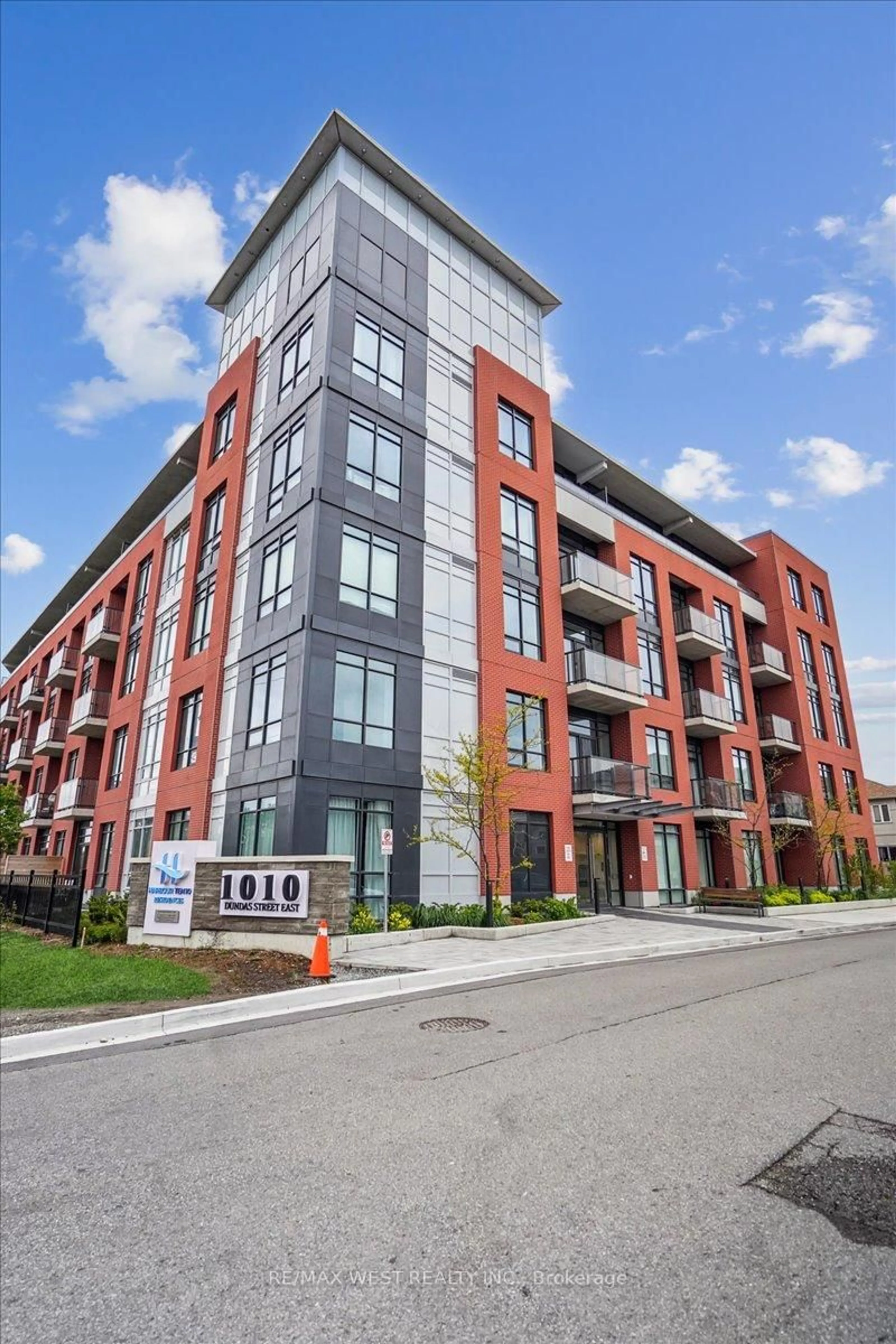 Home with brick exterior material, building for 1010 Dundas St #211, Whitby Ontario L1N 2K2