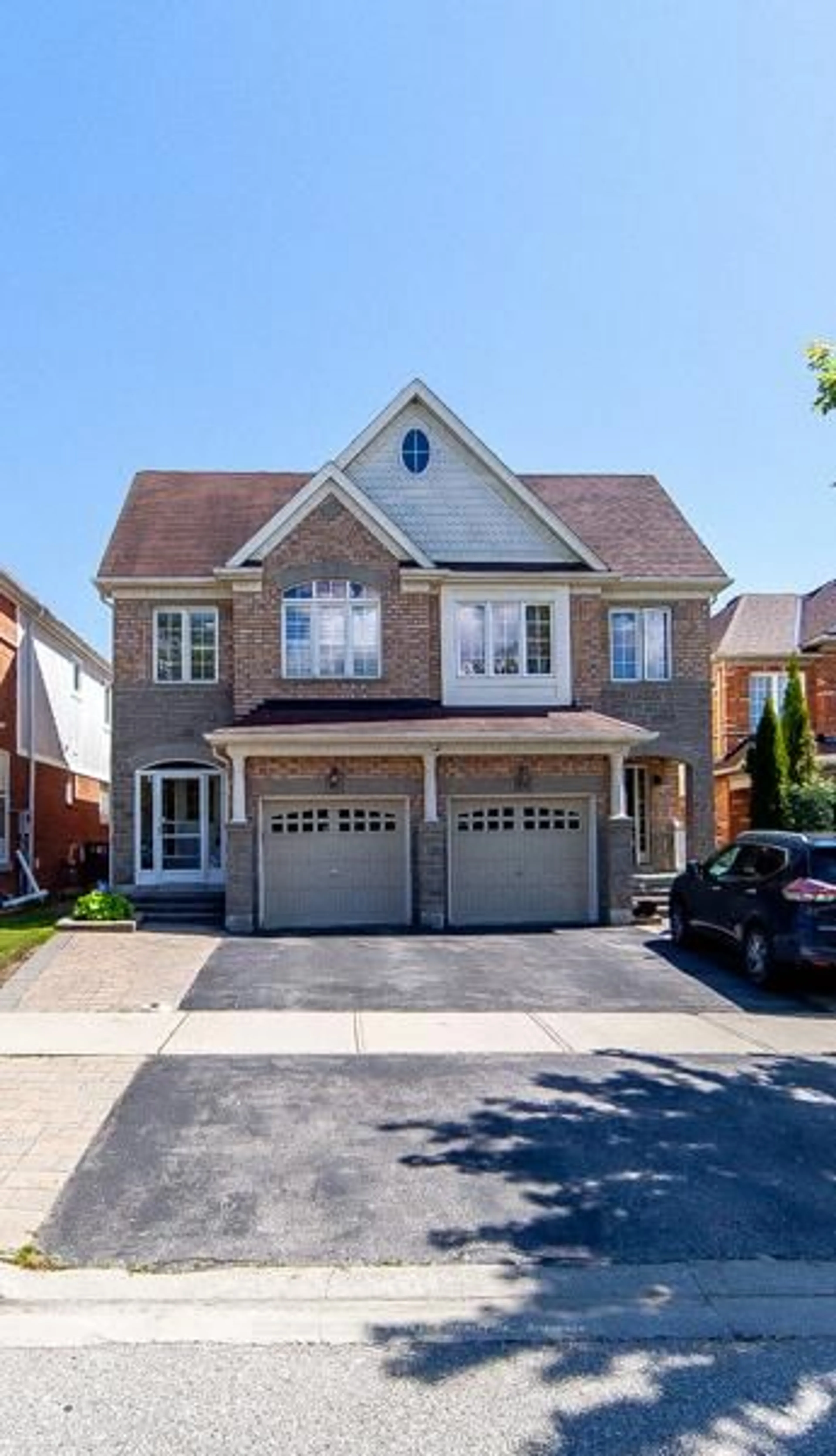 Home with brick exterior material, street for 86 Tozer Cres, Ajax Ontario L1T 5A2