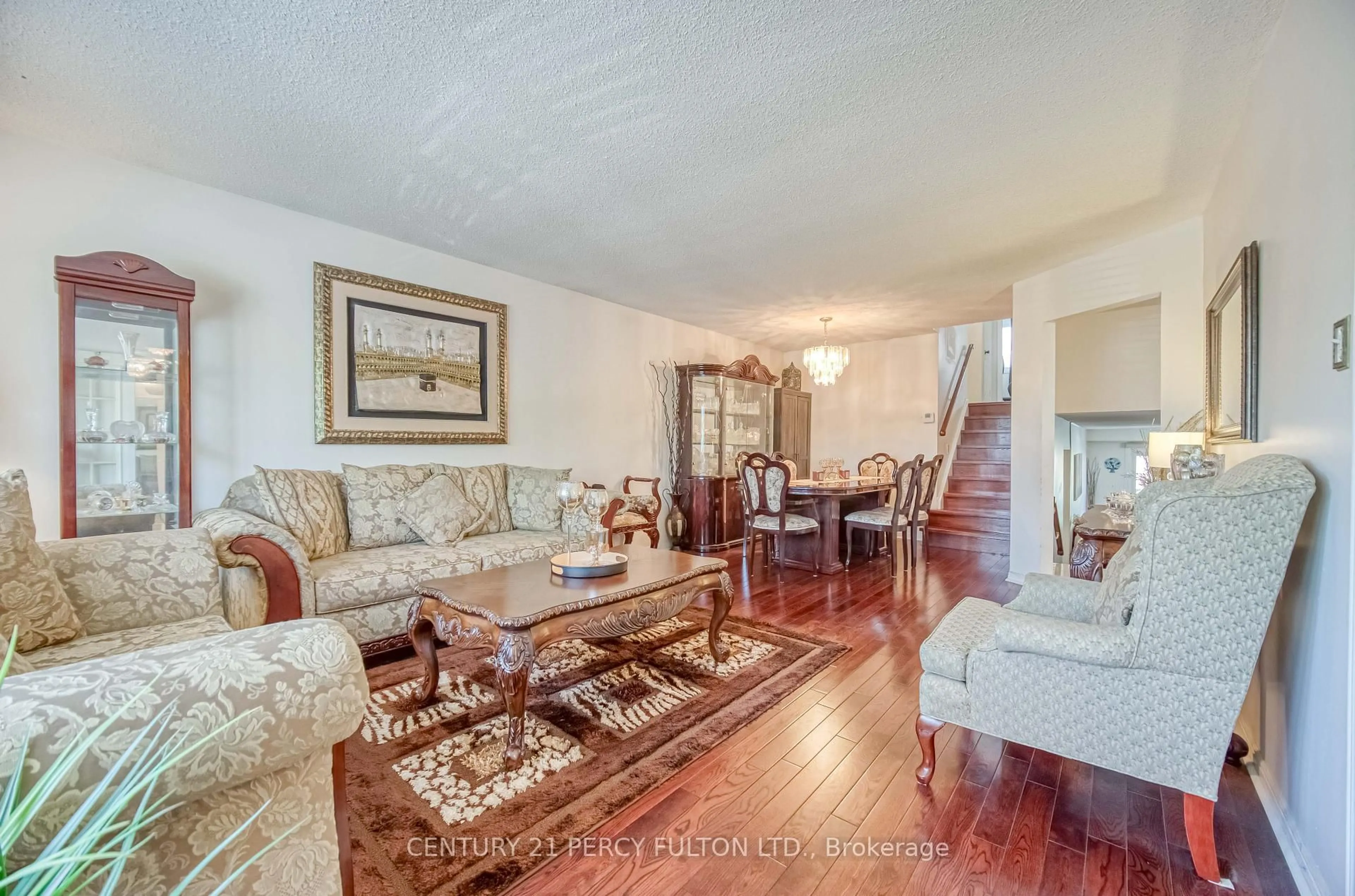 Living room with furniture, wood/laminate floor for 120 Granada Cres, Toronto Ontario M1B 2H5