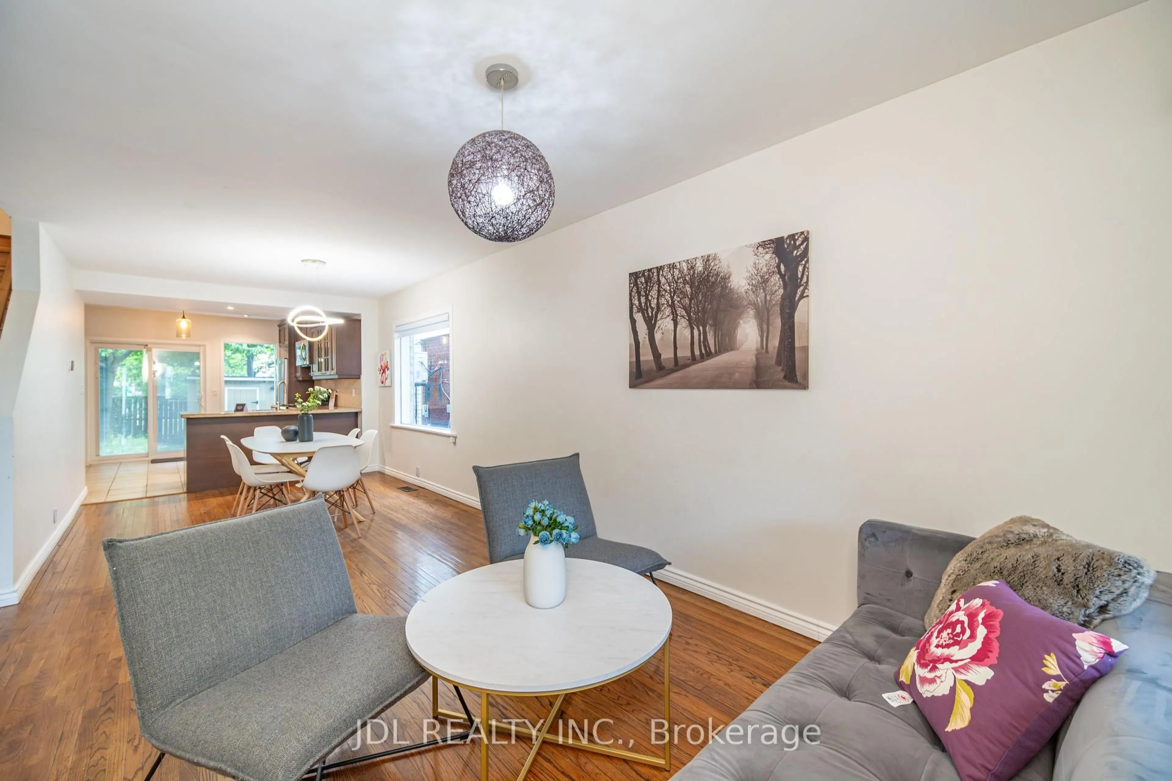 Living room with furniture, wood/laminate floor for 14 athletic ave Ave, Toronto Ontario M4L 1W6